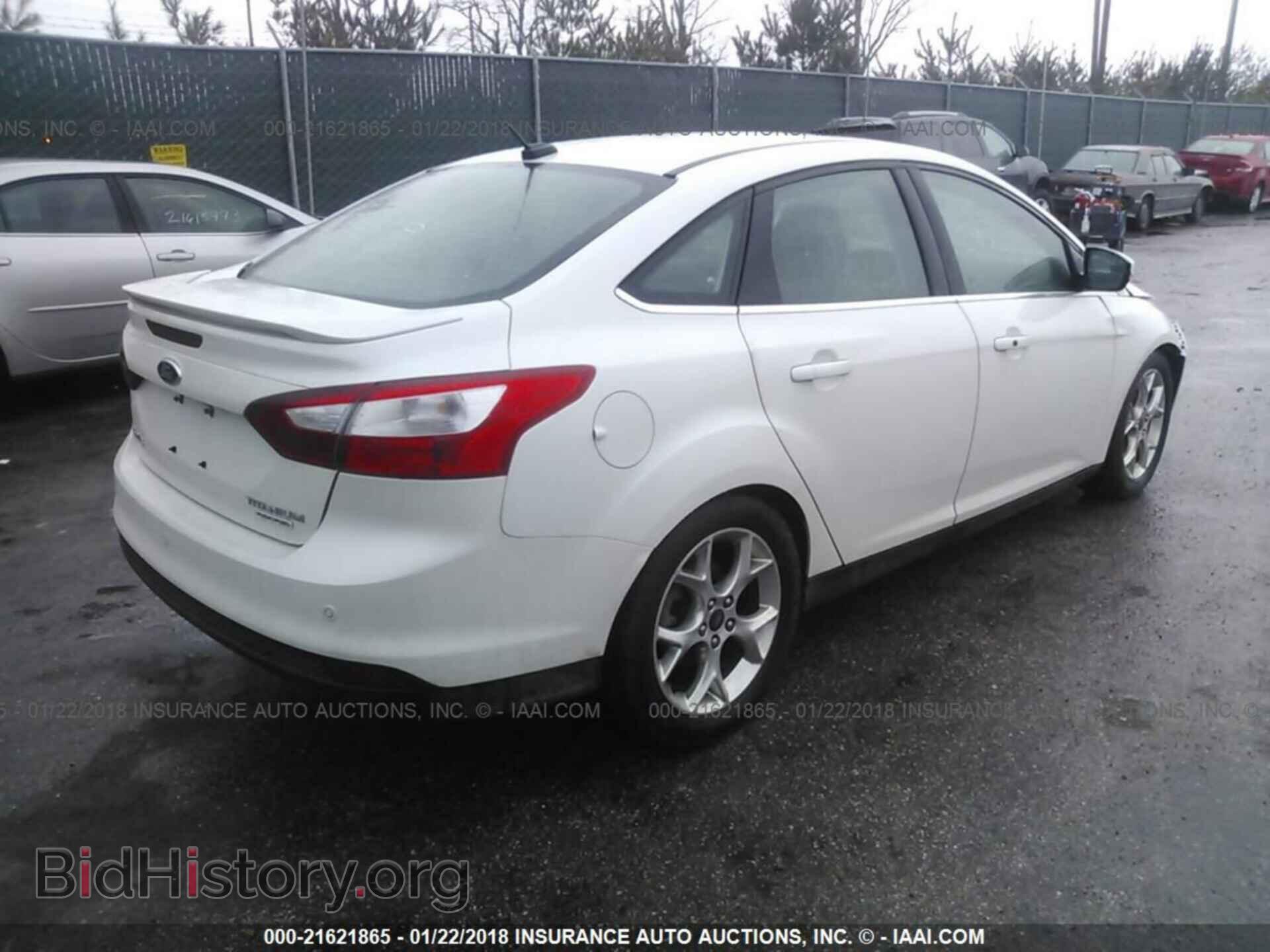 2014 Ford Focus - VIN: 1FADP3J22EL234599 - Photo 4