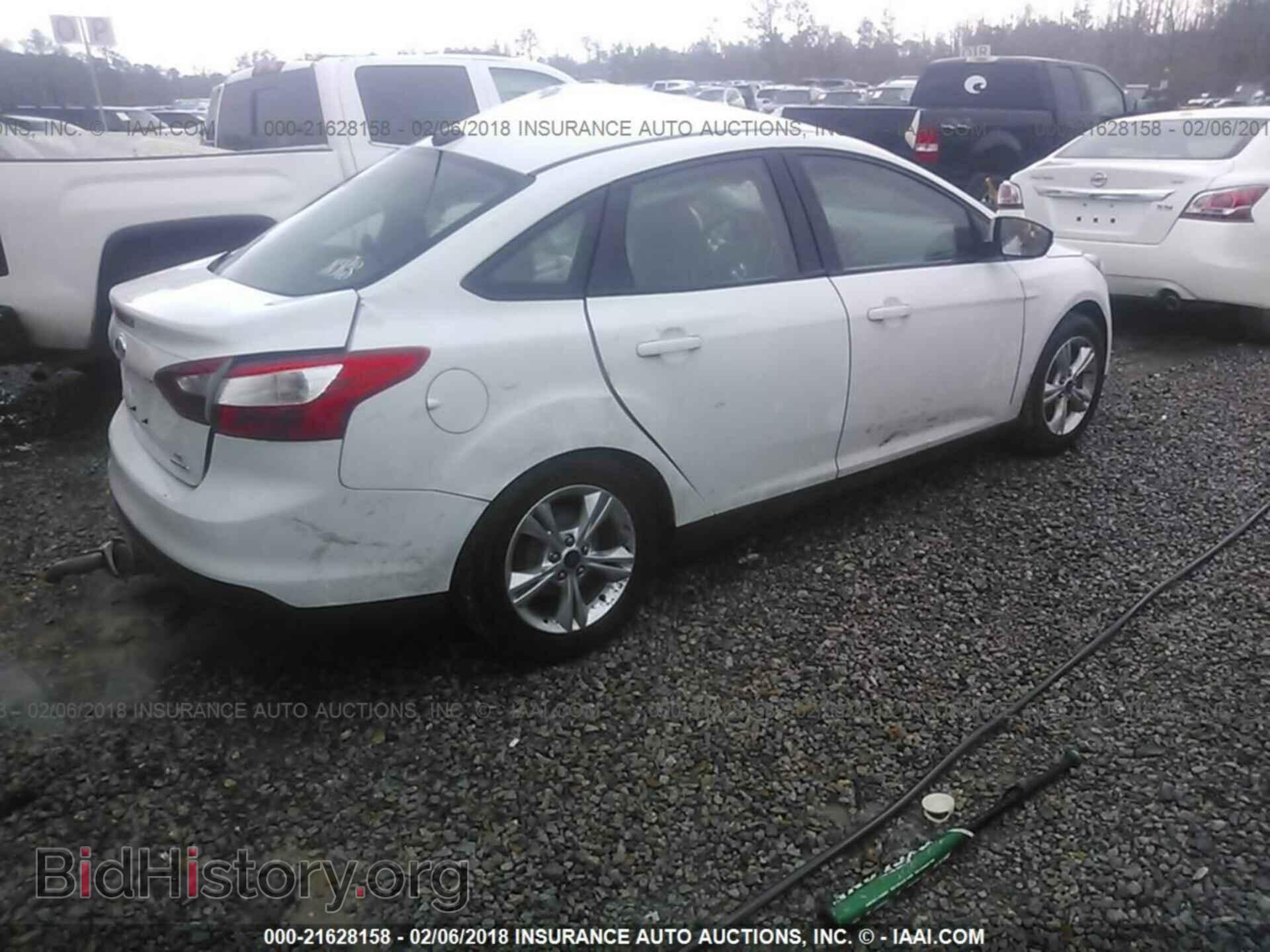 2014 Ford Focus - VIN: 1FADP3F29EL392186 - Фото 4