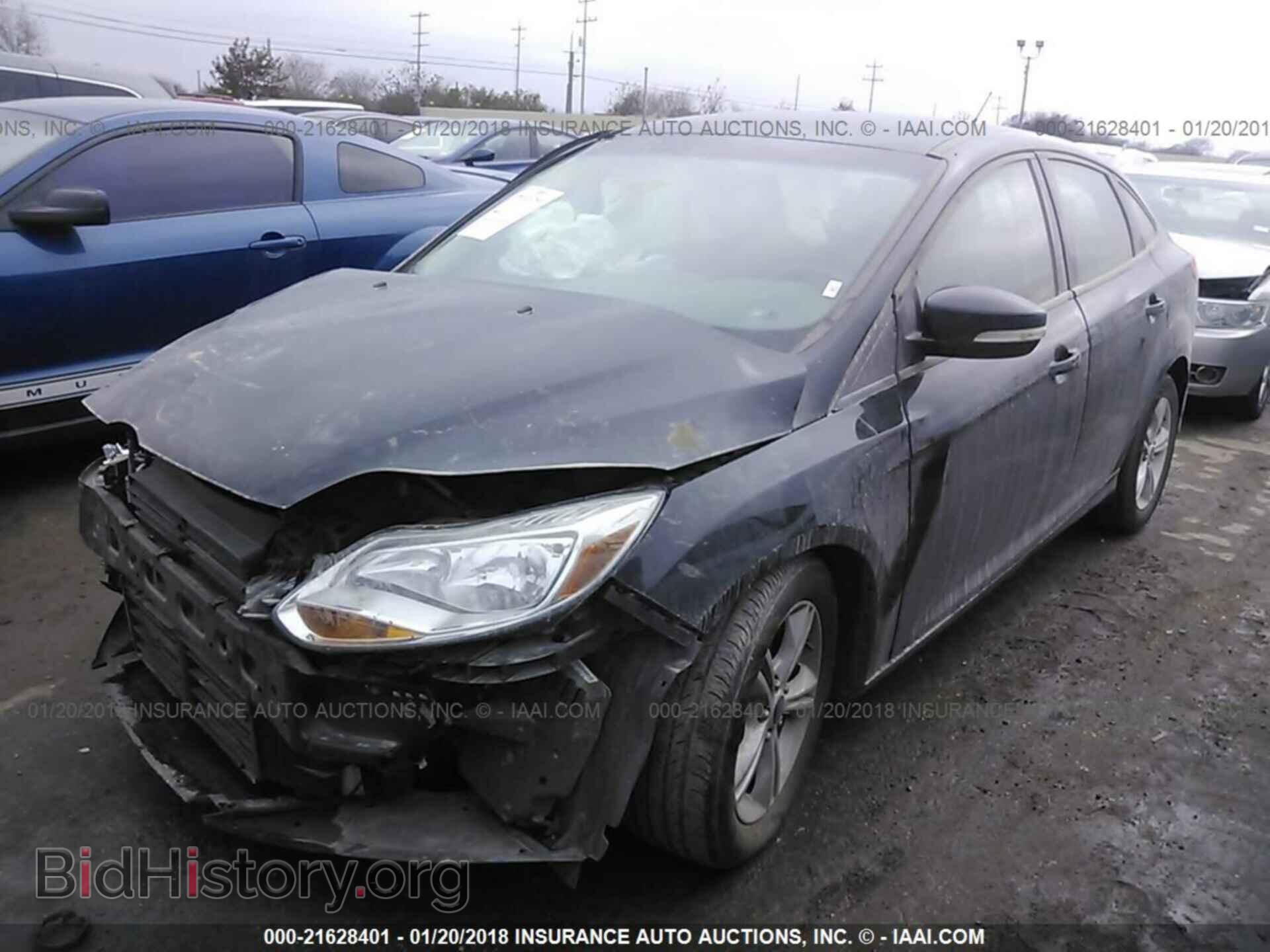2014 Ford Focus - VIN: 1FADP3F22EL406302 - Photo 2