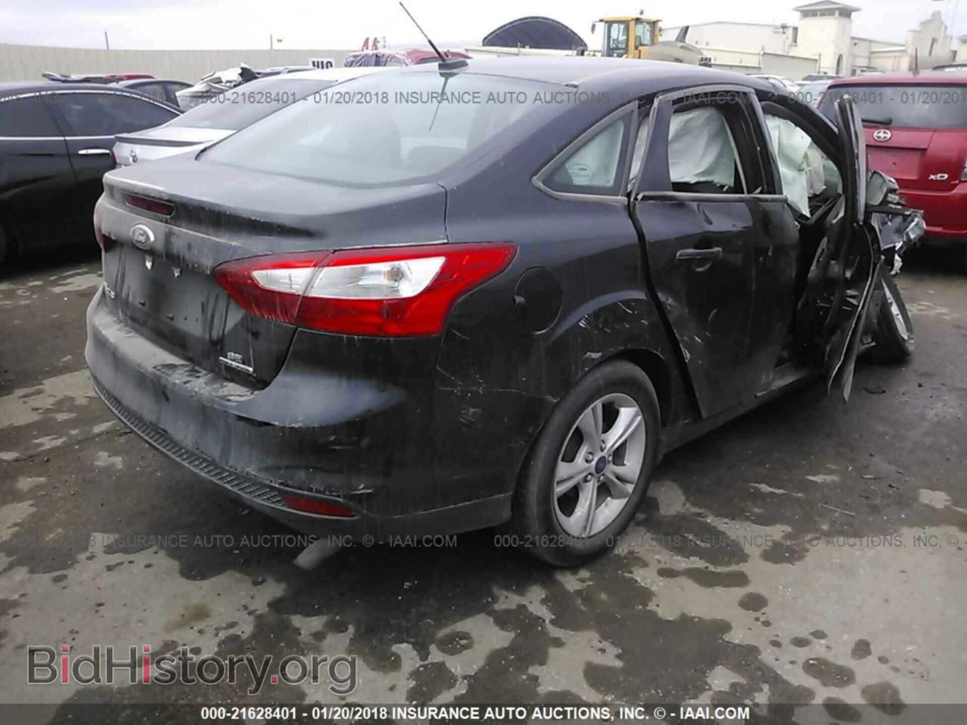 2014 Ford Focus - VIN: 1FADP3F22EL406302 - Photo 4