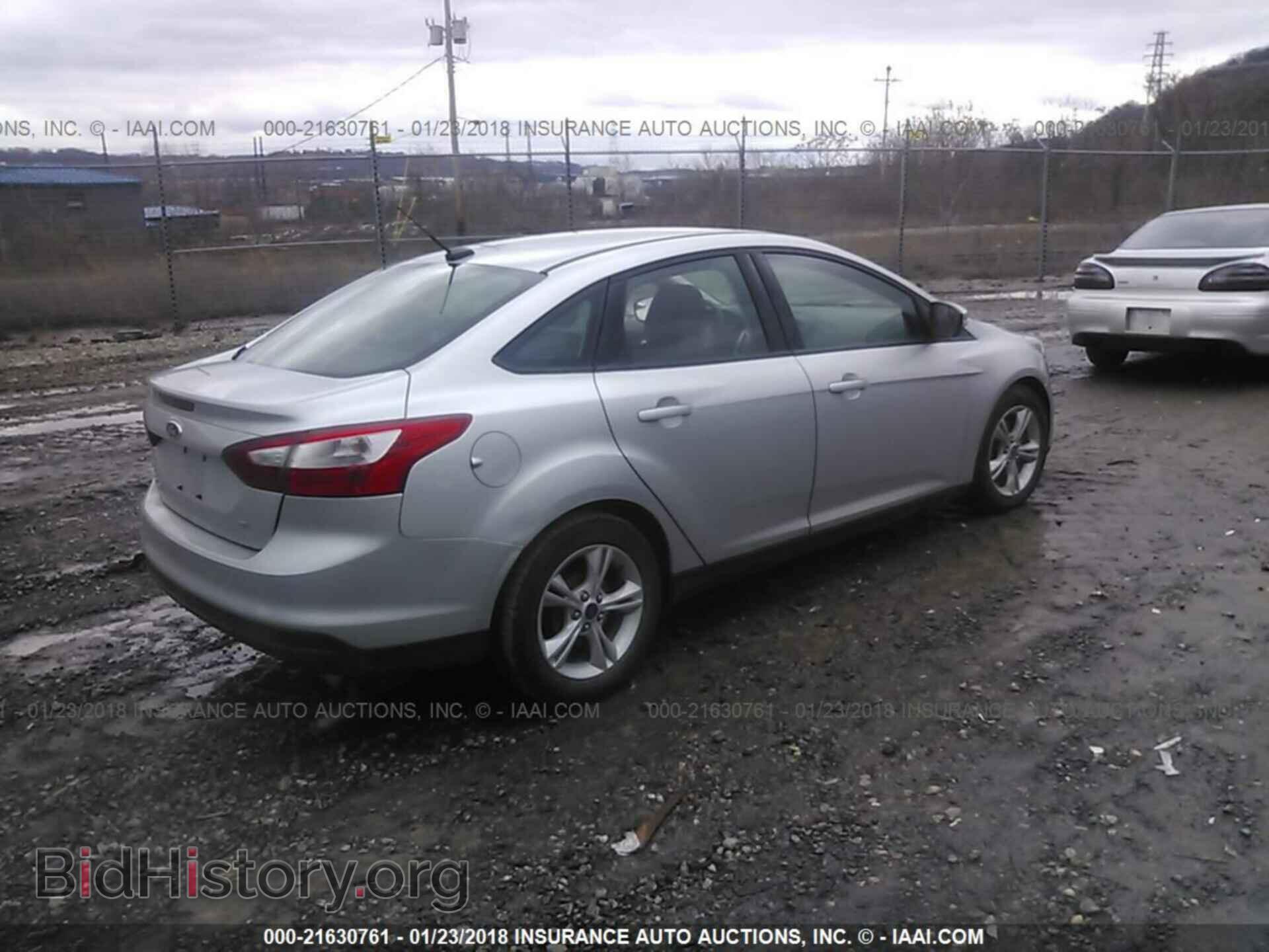 2014 Ford Focus - VIN: 1FADP3F21EL459203 - Photo 4