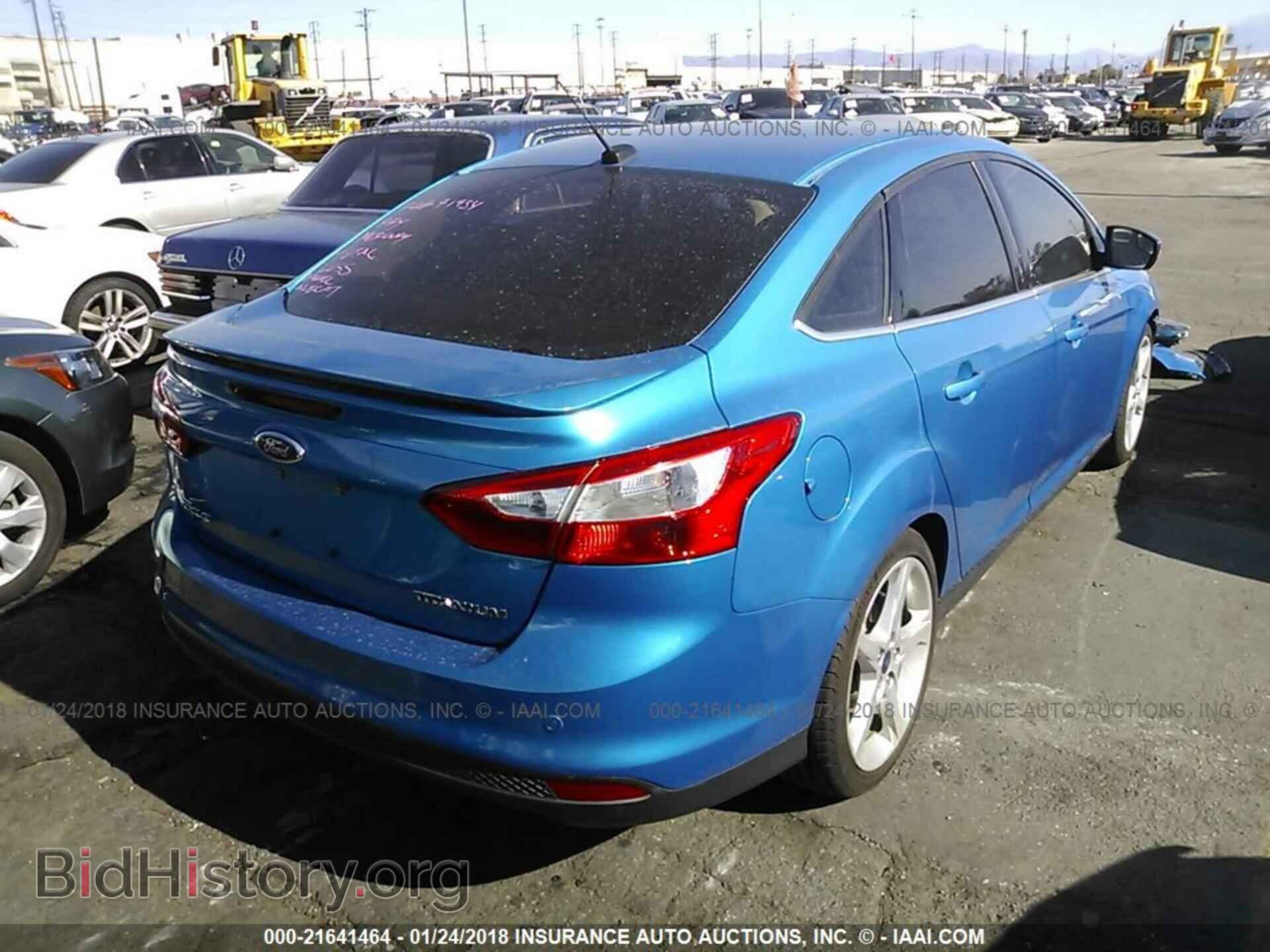 2014 Ford Focus - VIN: 1FADP3J28EL341480 - Photo 4