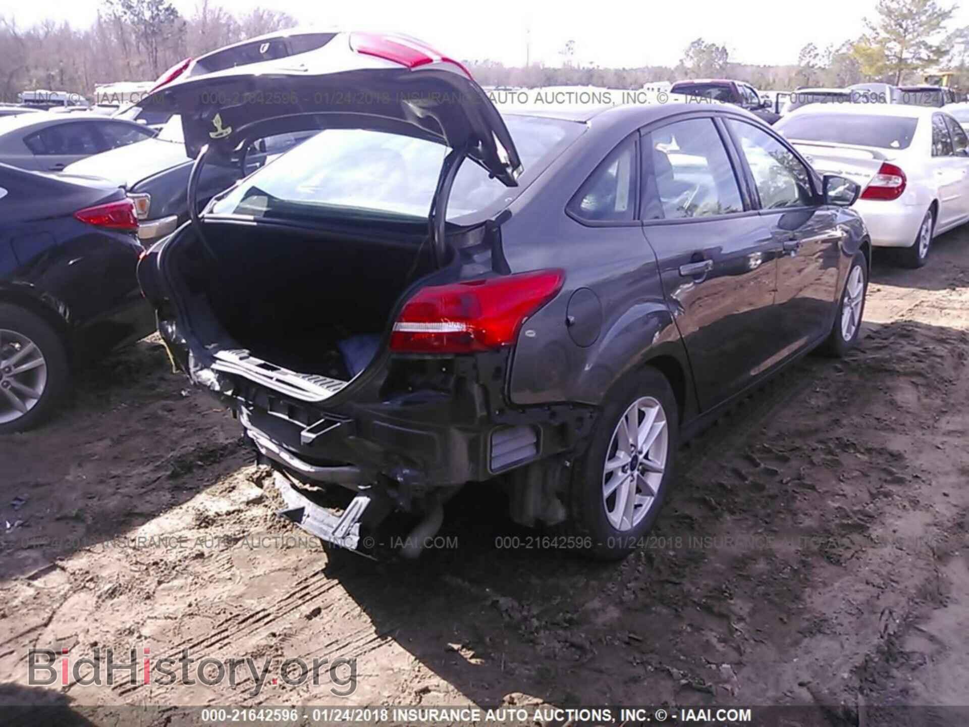 2015 Ford Focus - VIN: 1FADP3F20FL202292 - Photo 4