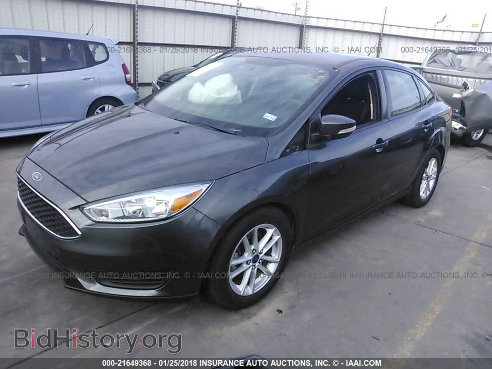 2015 Ford Focus - VIN: 1FADP3F21FL242672 - Photo 2