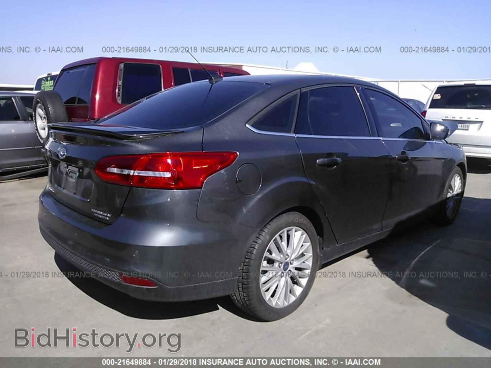 2015 Ford Focus - VIN: 1FADP3J25FL235327 - Photo 4