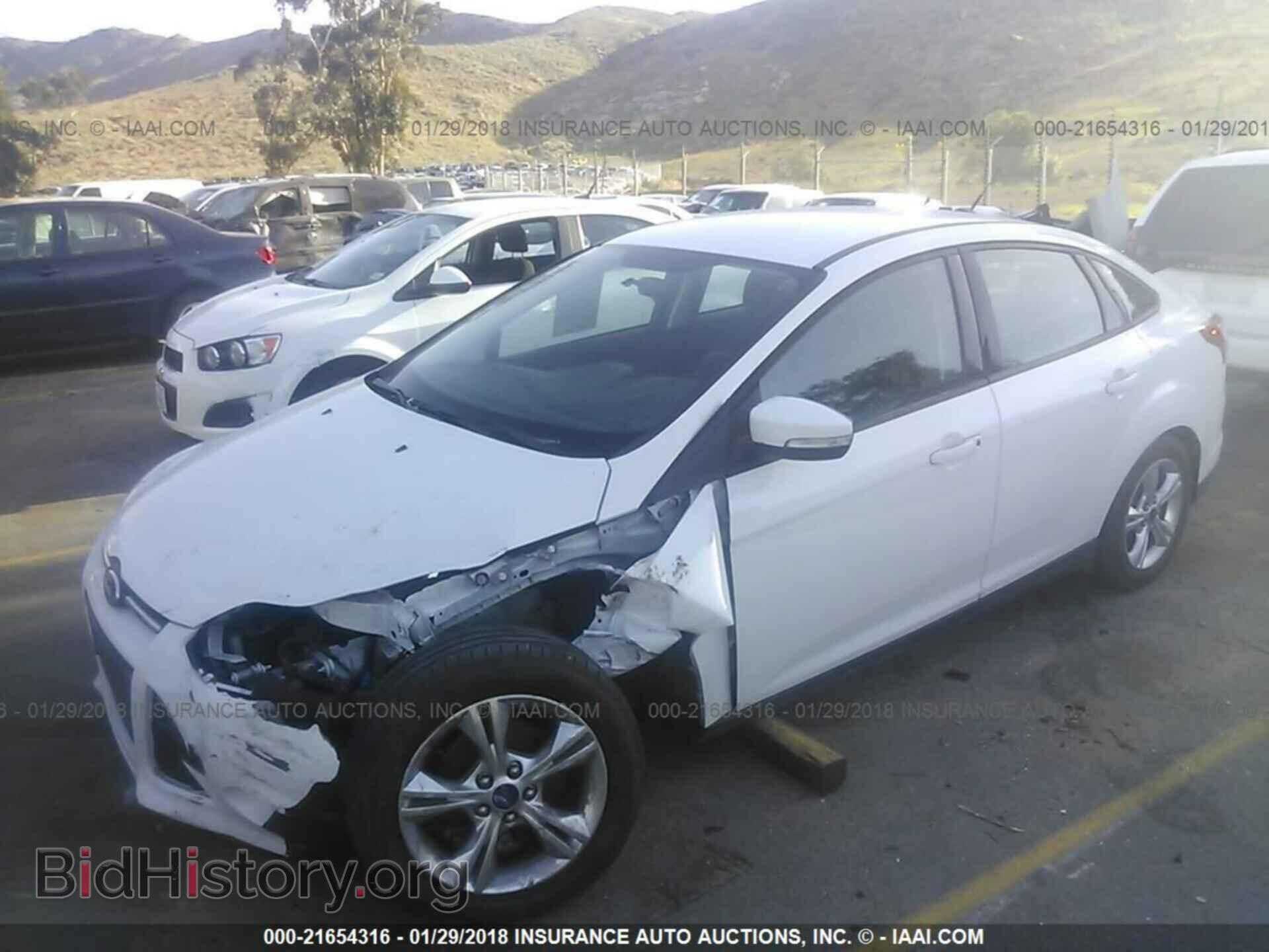 2013 Ford Focus - VIN: 1FADP3F26DL204772 - Фото 2