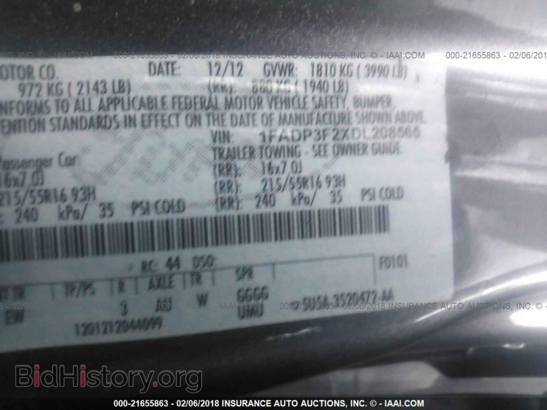 2013 Ford Focus - VIN: 1FADP3F2XDL208565 - Photo 9