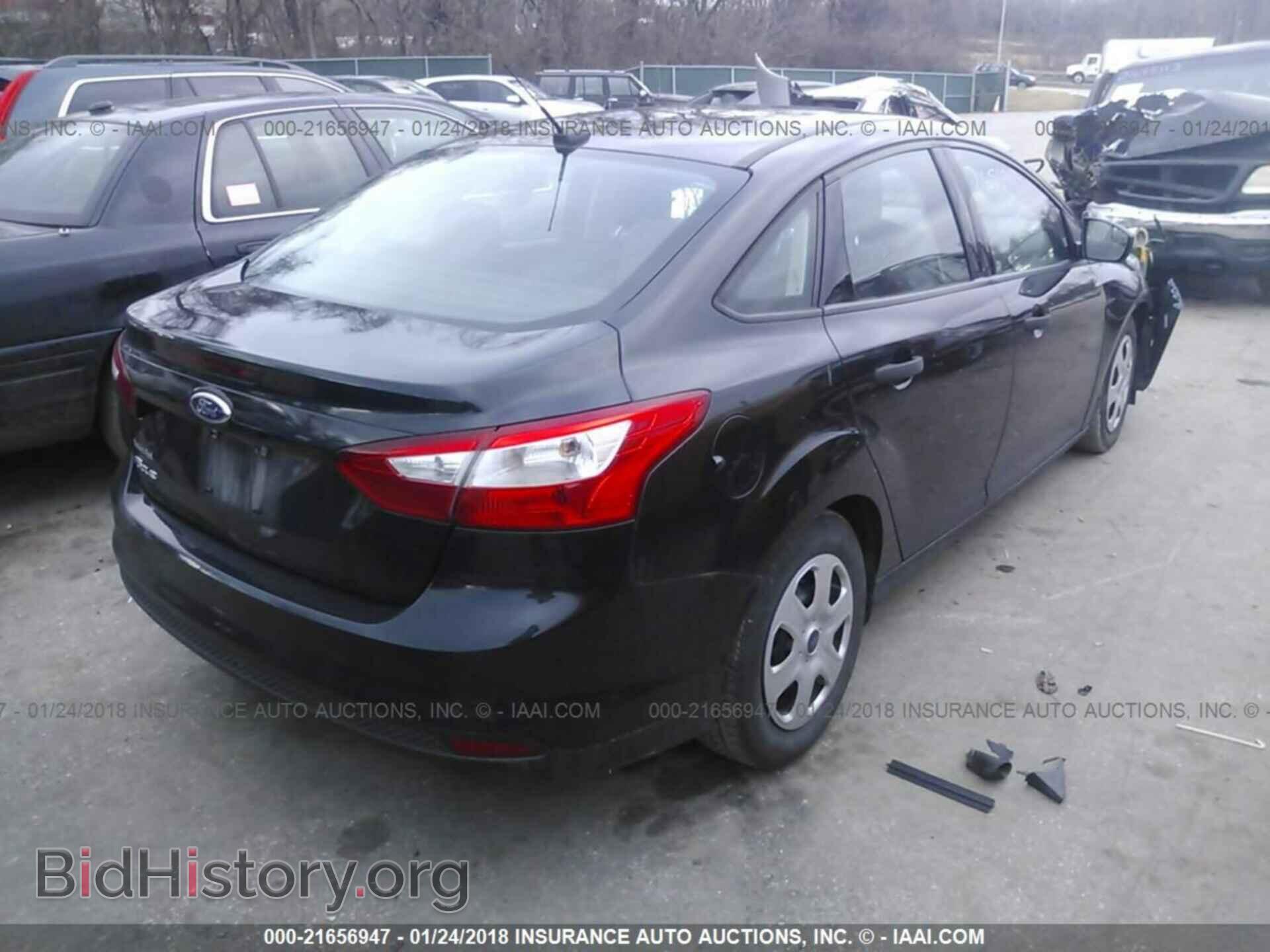 2014 Ford Focus - VIN: 1FADP3E21EL234281 - Фото 4