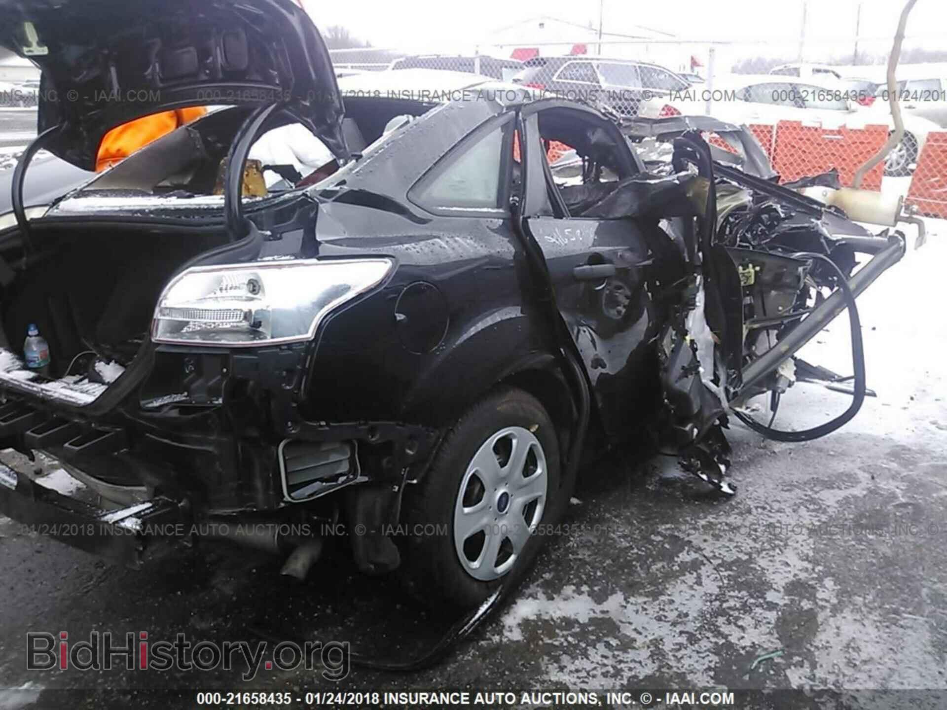 2016 Ford Focus - VIN: 1FADP3E28GL398310 - Photo 4
