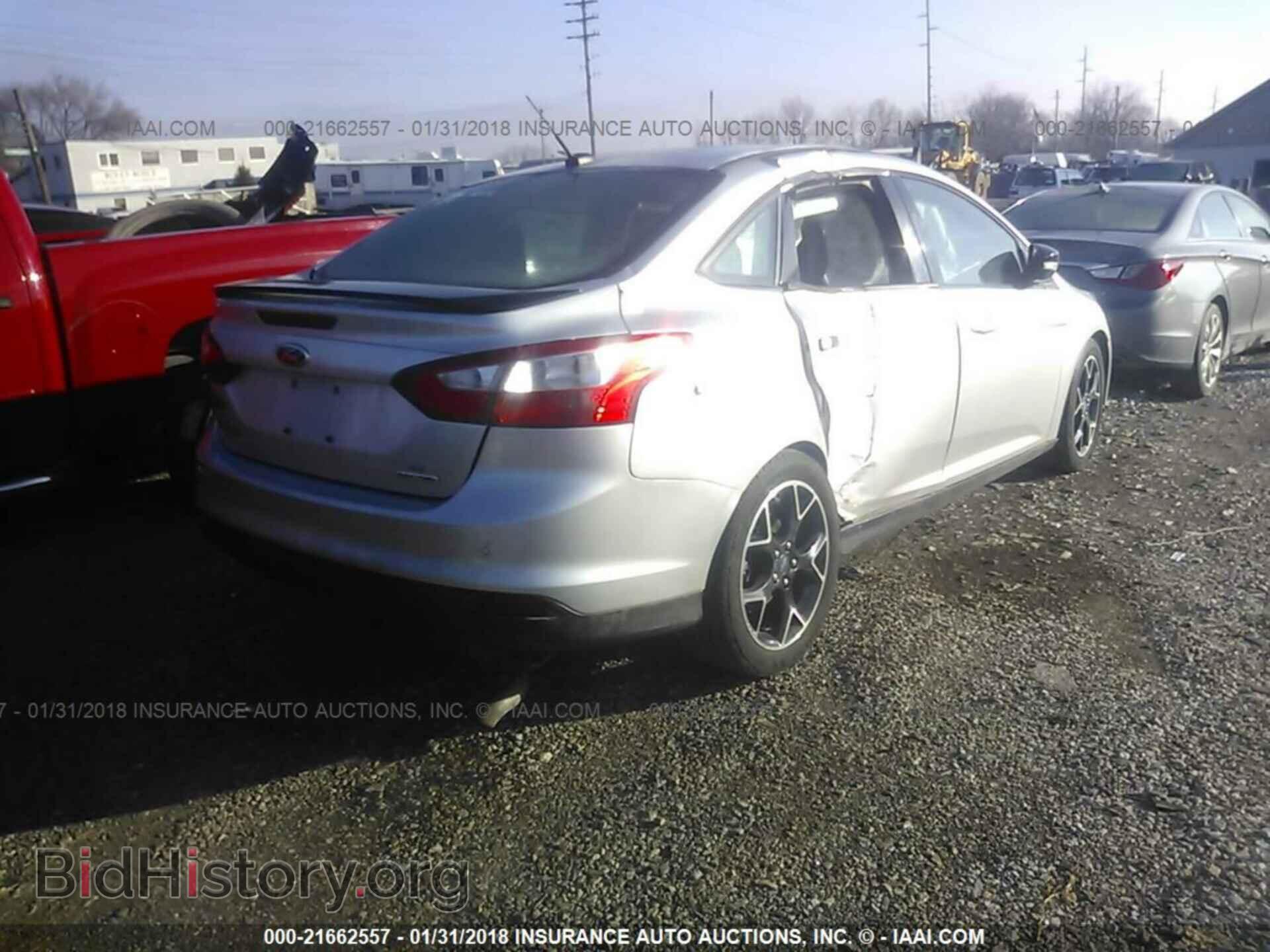 2014 Ford Focus - VIN: 1FADP3F21EL136771 - Photo 4
