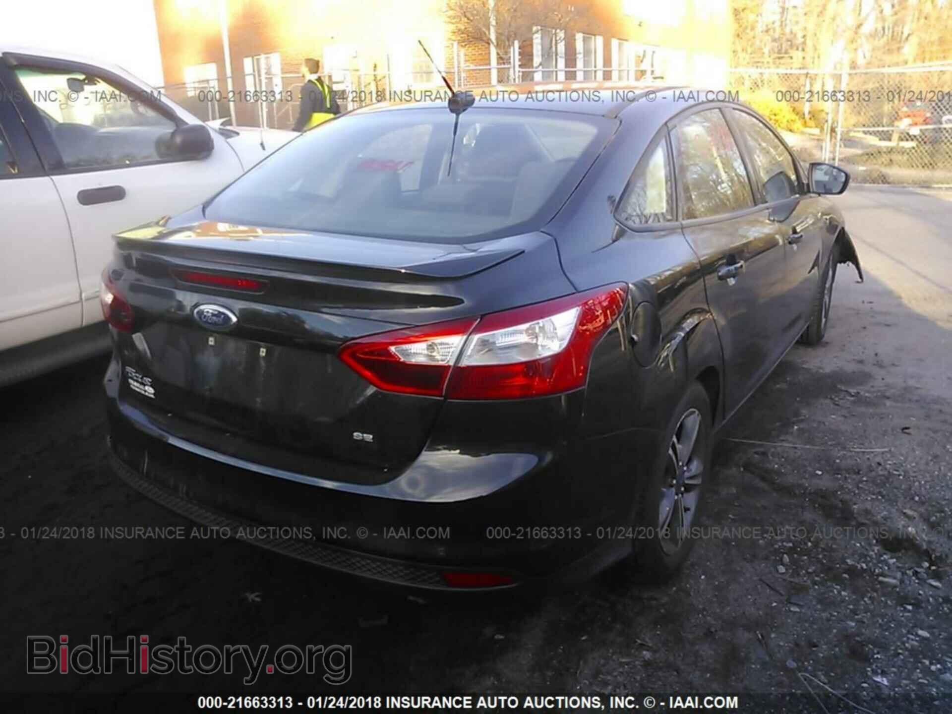 2014 Ford Focus - VIN: 1FADP3F24EL352971 - Фото 4