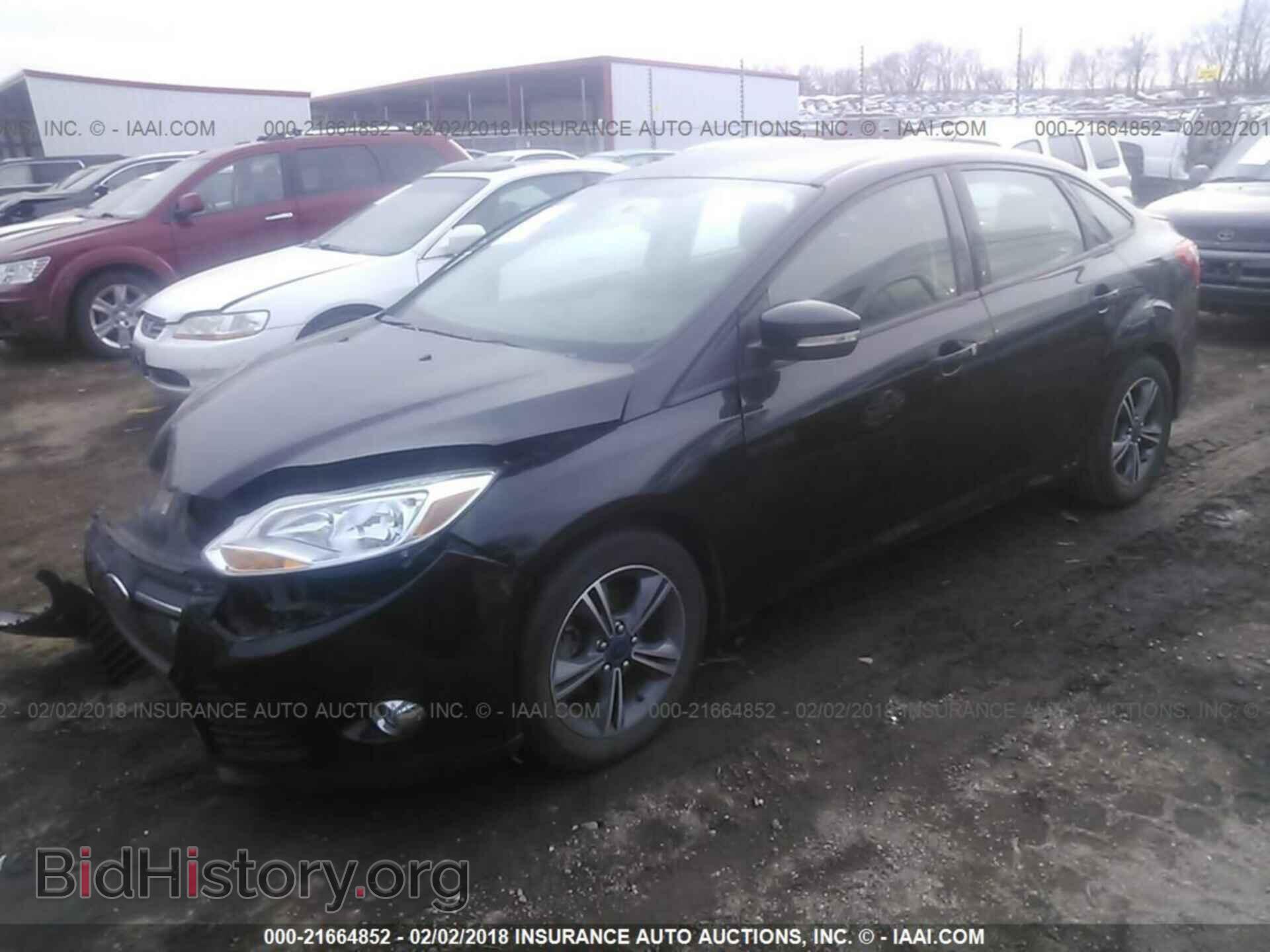 2014 Ford Focus - VIN: 1FADP3F23EL270858 - Photo 2