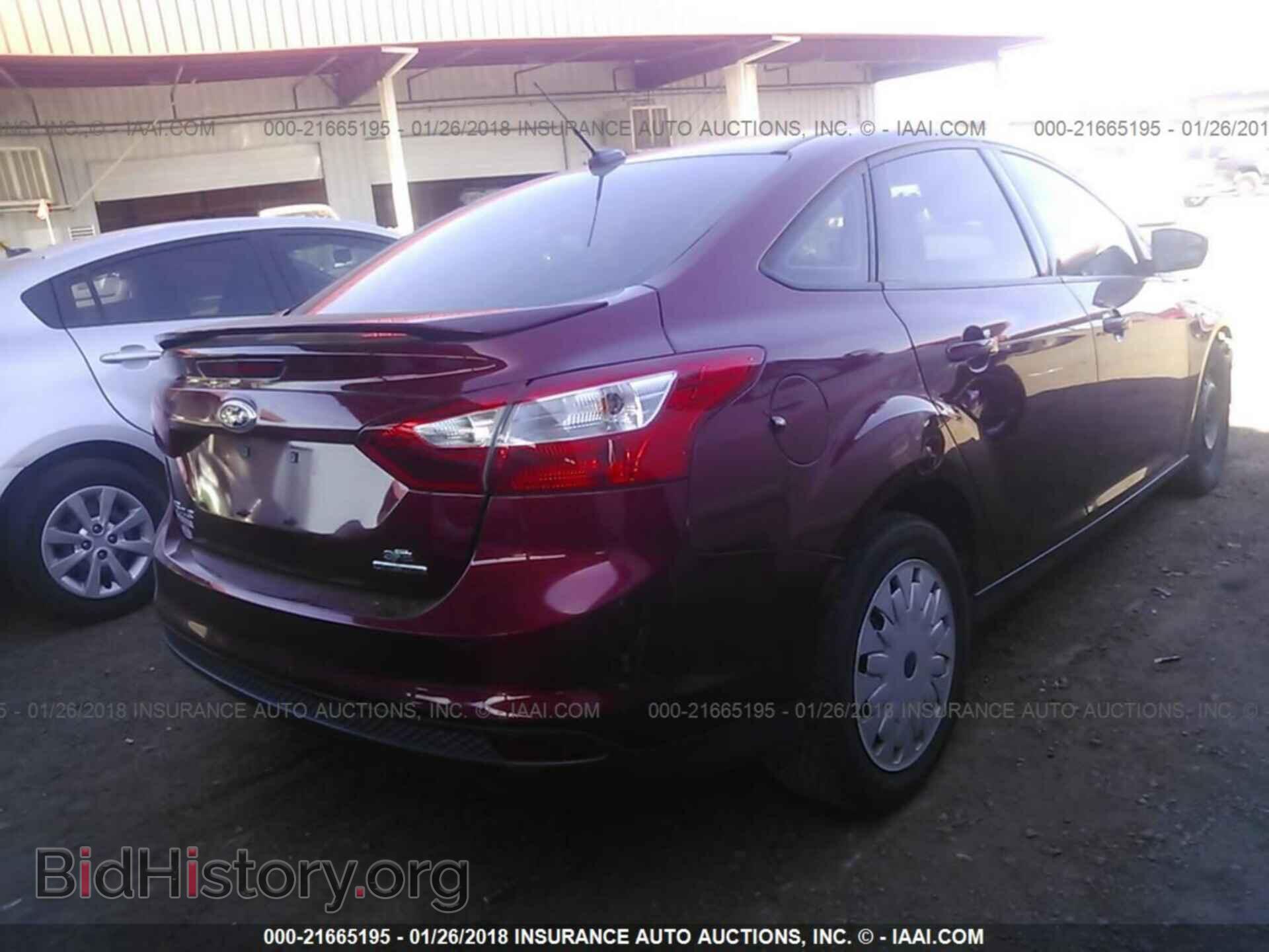 2014 Ford Focus - VIN: 1FADP3F27EL306003 - Photo 4