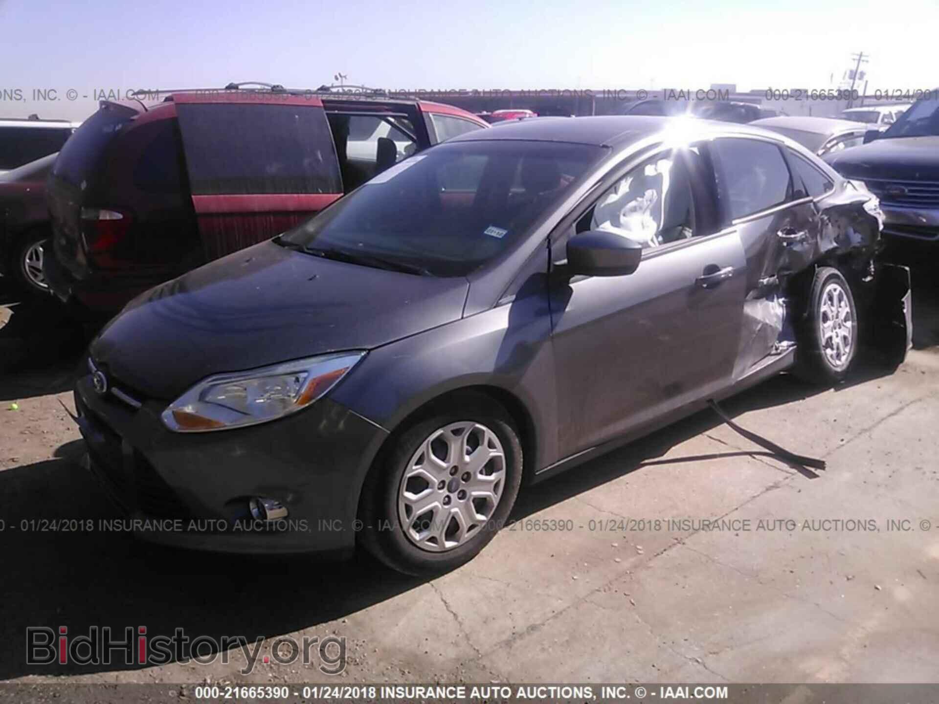 2012 Ford Focus - VIN: 1FAHP3F21CL381990 - Photo 2