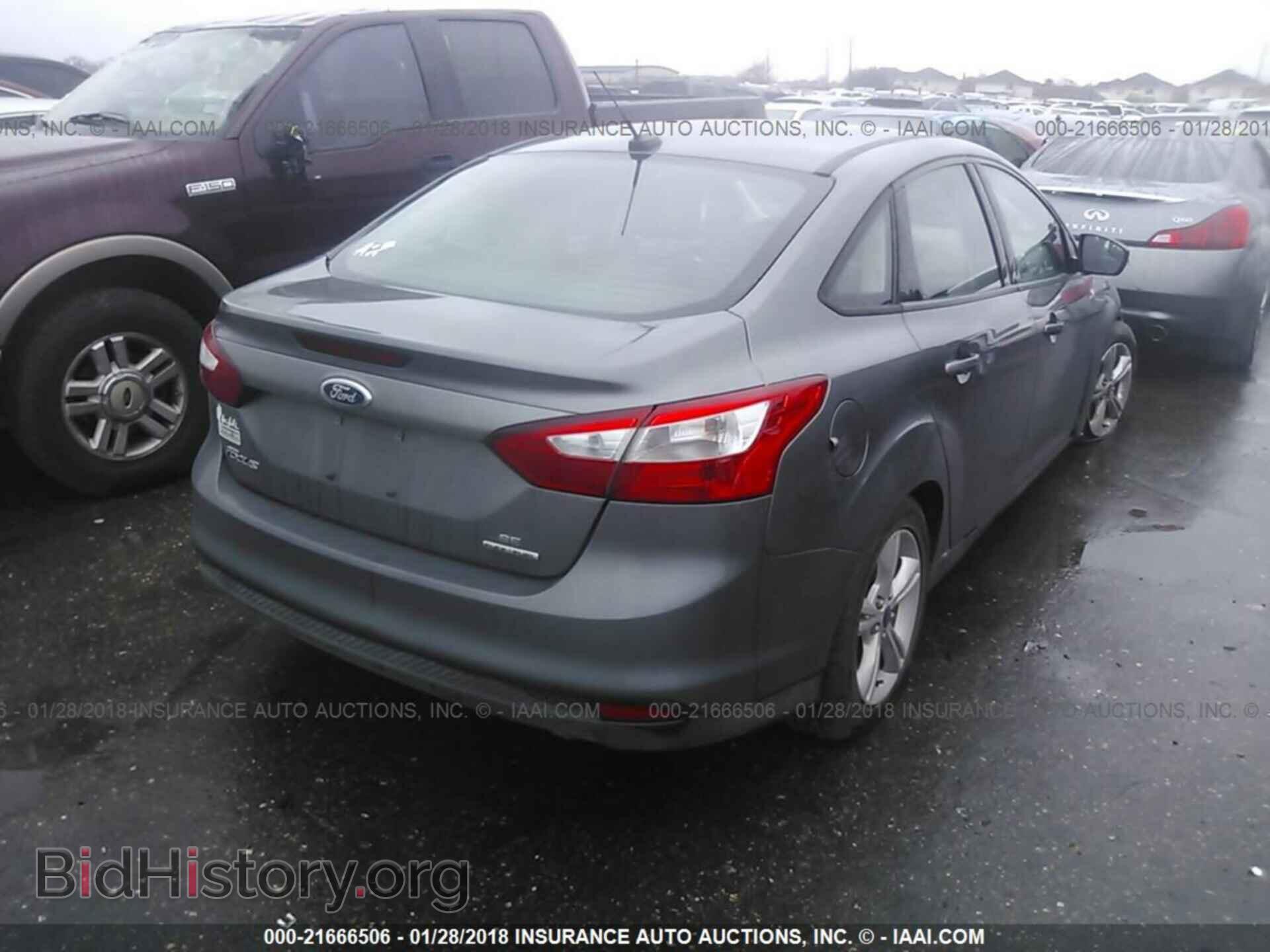 2014 Ford Focus - VIN: 1FADP3F20EL218250 - Фото 4
