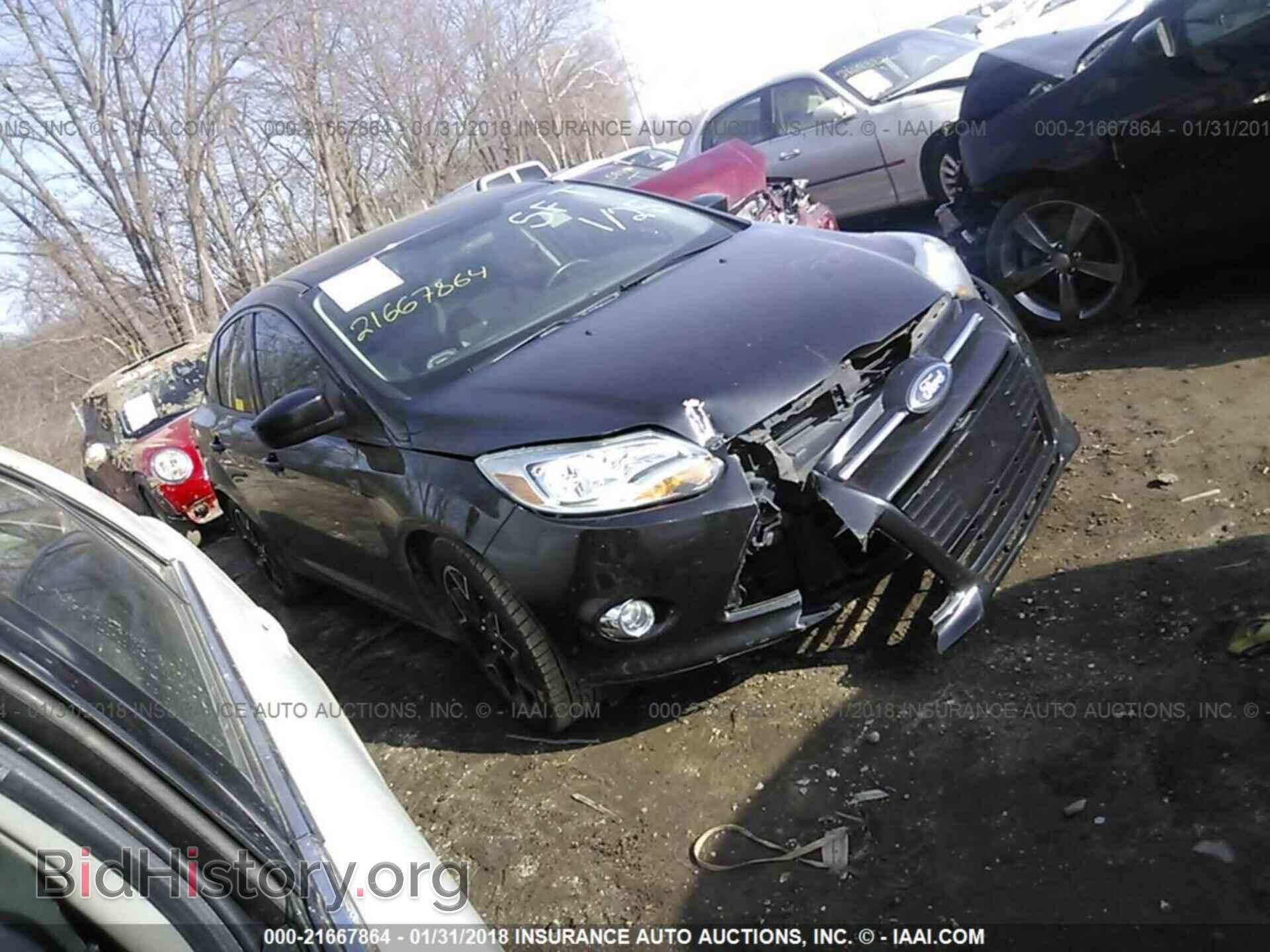 Photo 1FAHP3F25CL323705 - Ford Focus 2012