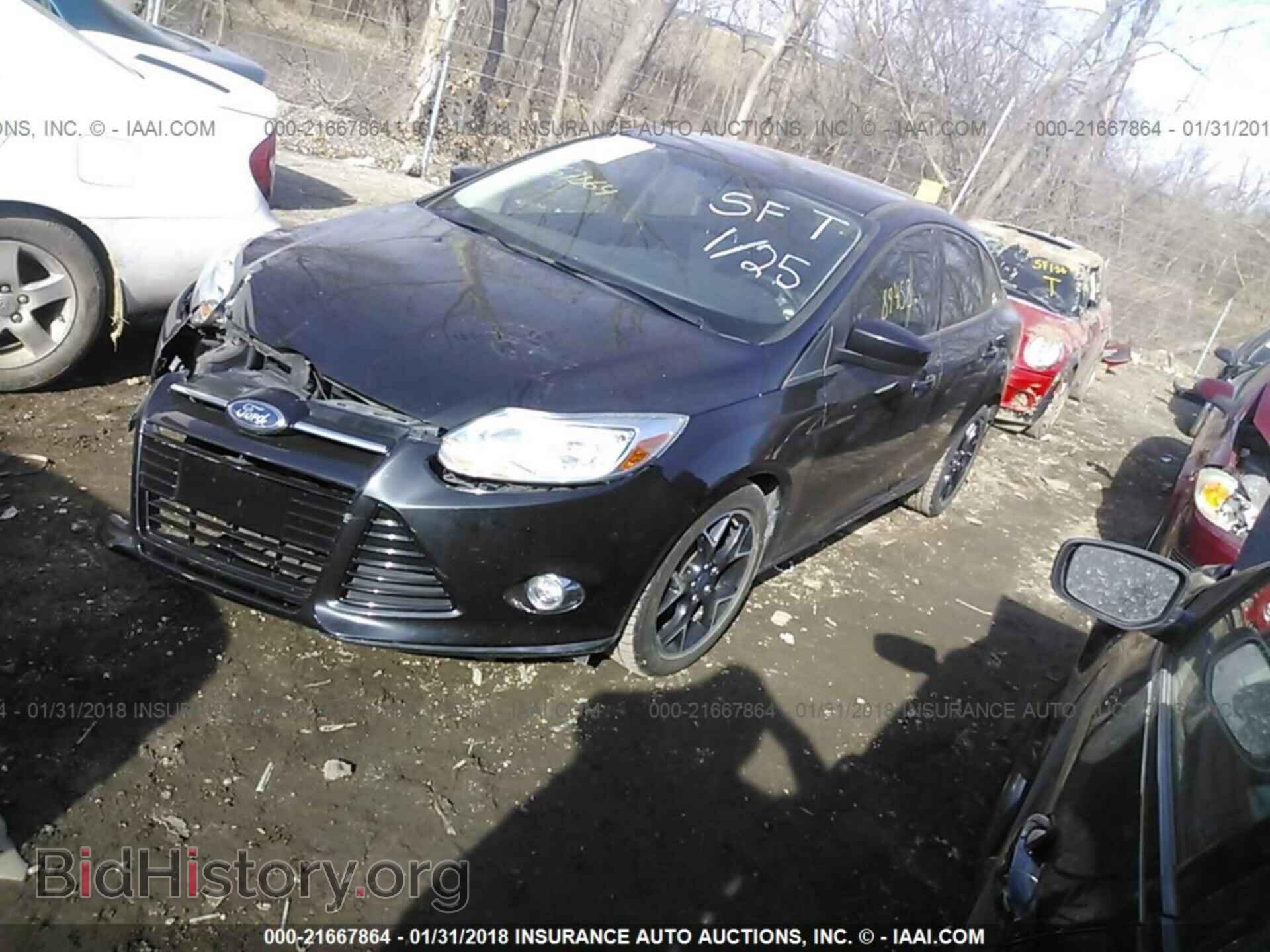 2012 Ford Focus - VIN: 1FAHP3F25CL323705 - Photo 2