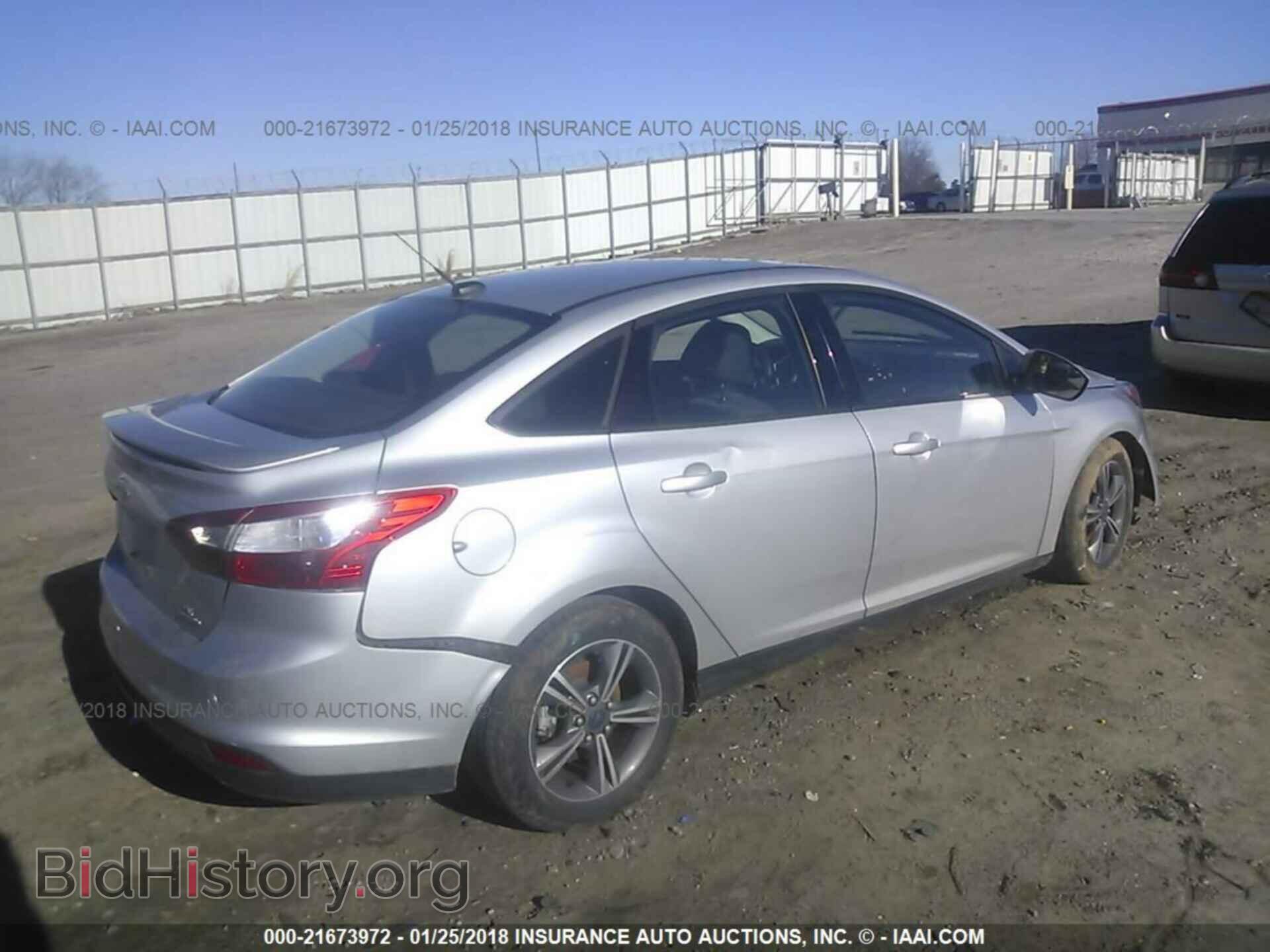2014 Ford Focus - VIN: 1FADP3F23EL353612 - Photo 4