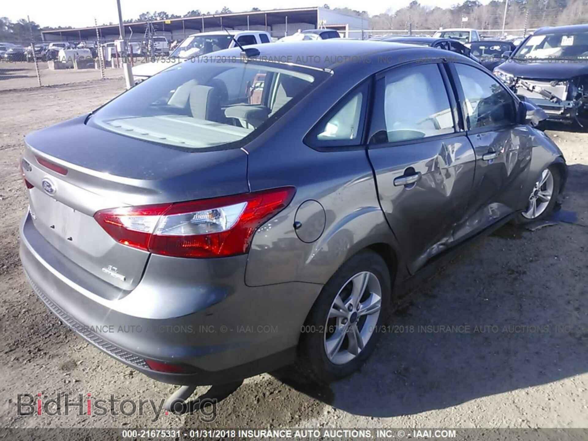 2014 Ford Focus - VIN: 1FADP3F25EL306937 - Photo 4