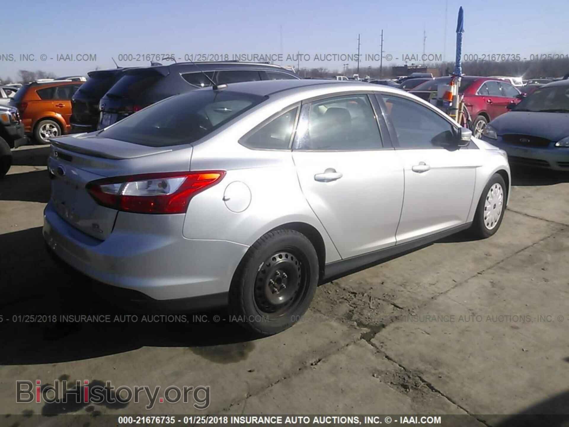 2013 Ford Focus - VIN: 1FADP3F28DL219614 - Photo 4