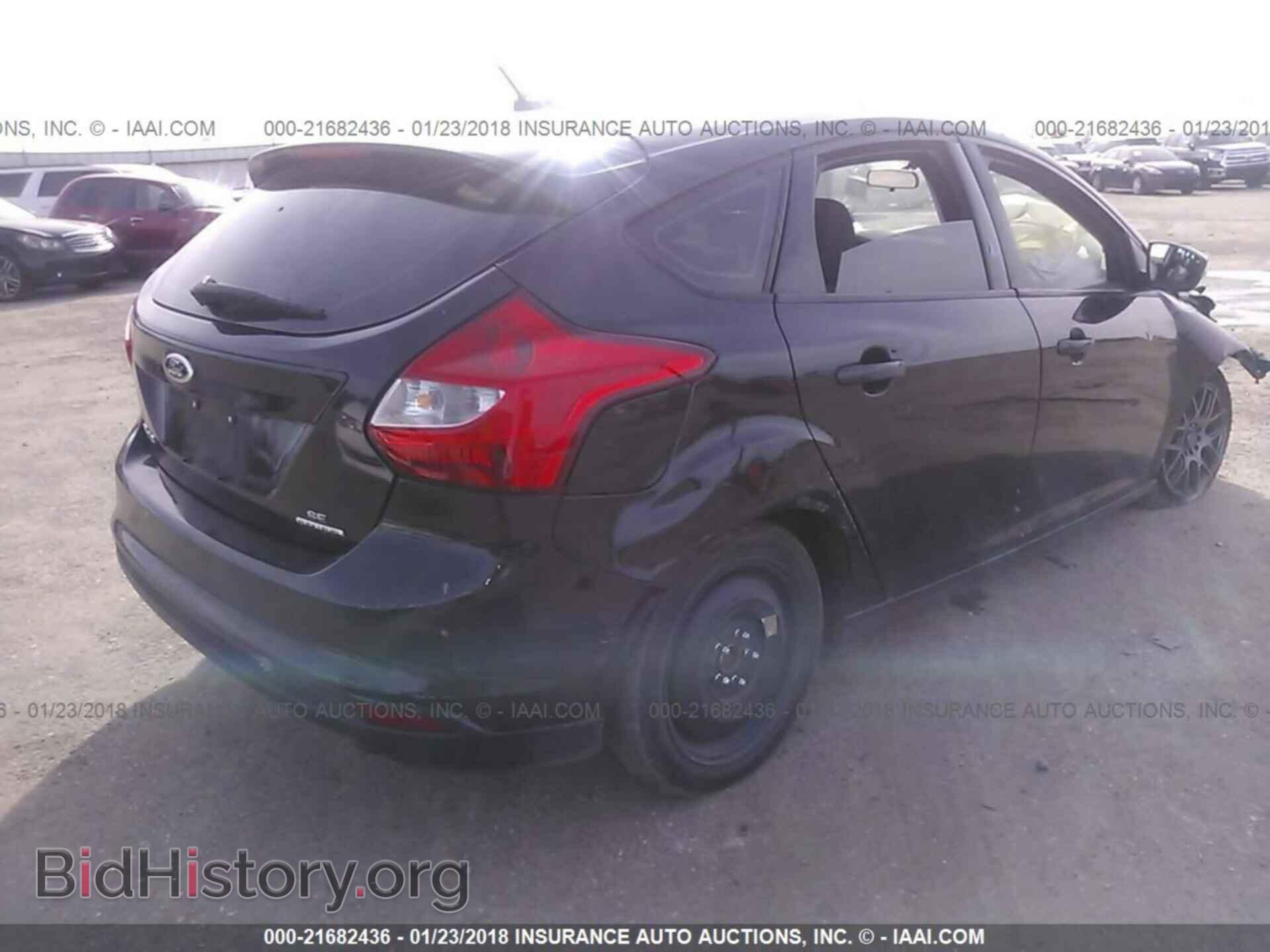 2014 Ford Focus - VIN: 1FADP3K27EL143598 - Photo 4