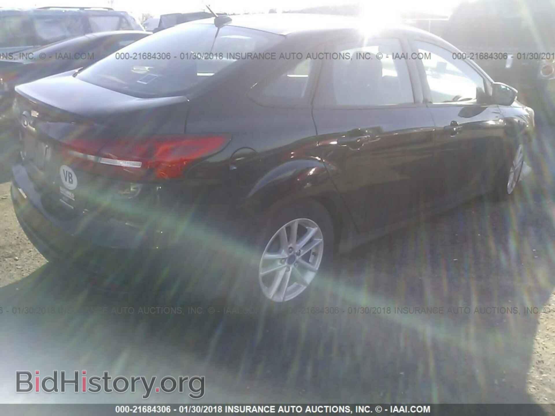 2016 Ford Focus - VIN: 1FADP3F23GL402889 - Photo 4