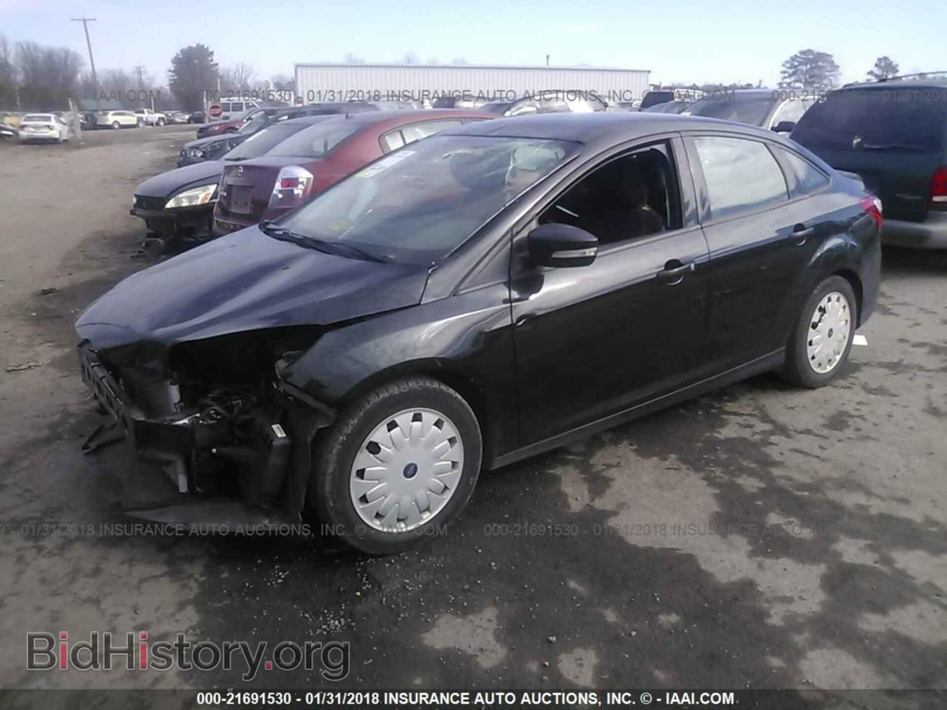 2014 Ford Focus - VIN: 1FADP3F27EL153509 - Photo 2
