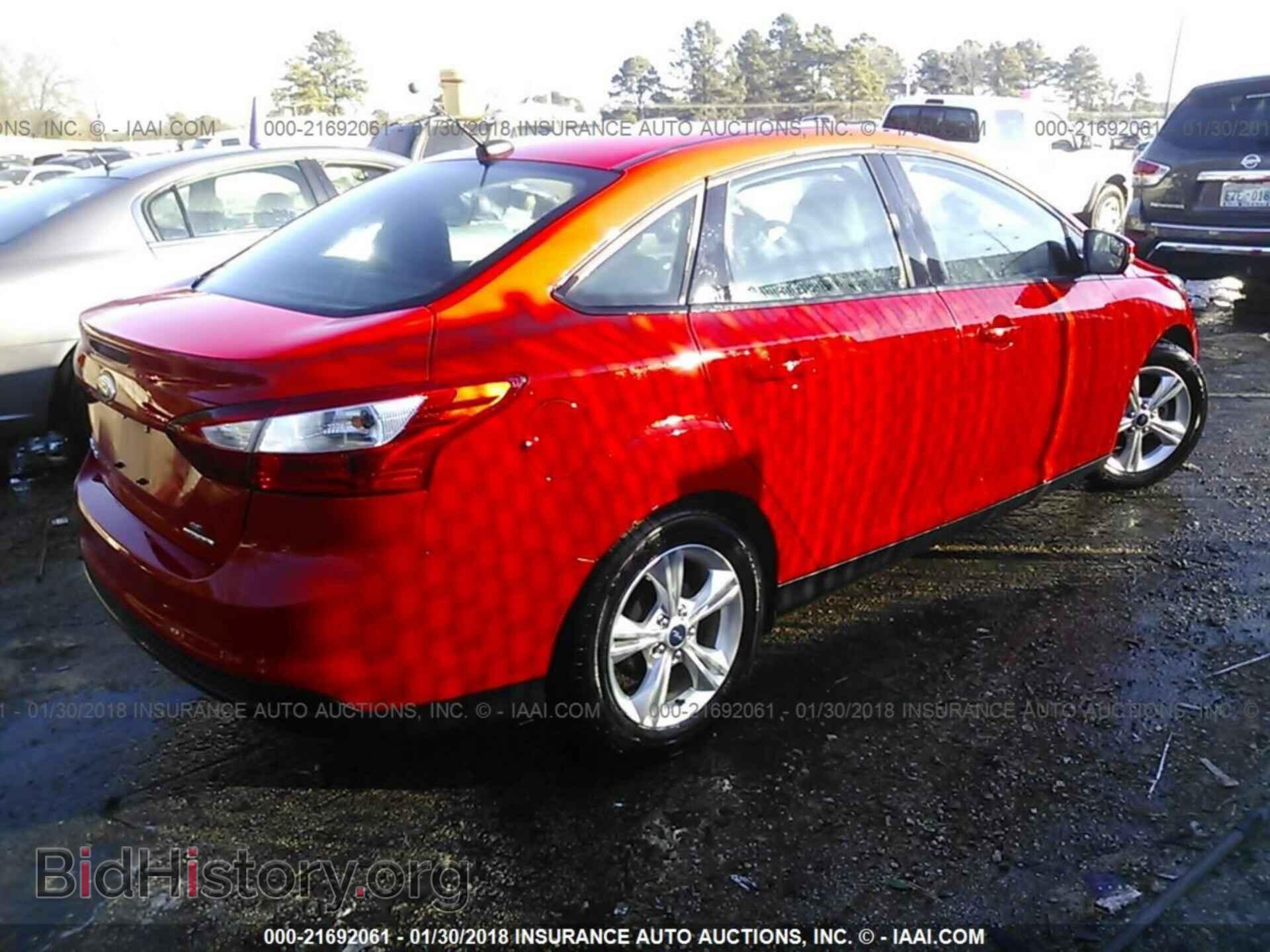 2014 Ford Focus - VIN: 1FADP3F22EL208612 - Photo 4