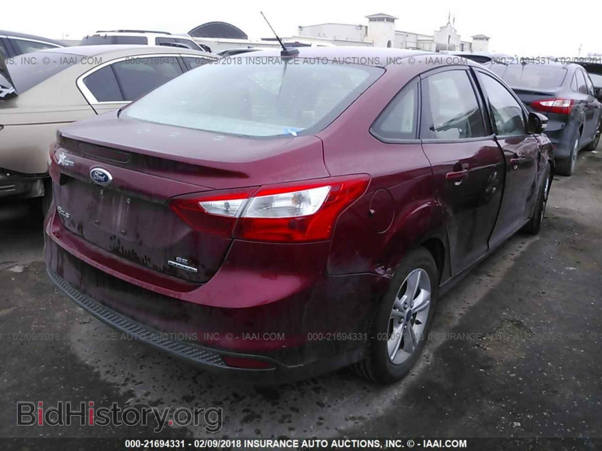 2014 Ford Focus - VIN: 1FADP3F20EL253757 - Photo 4