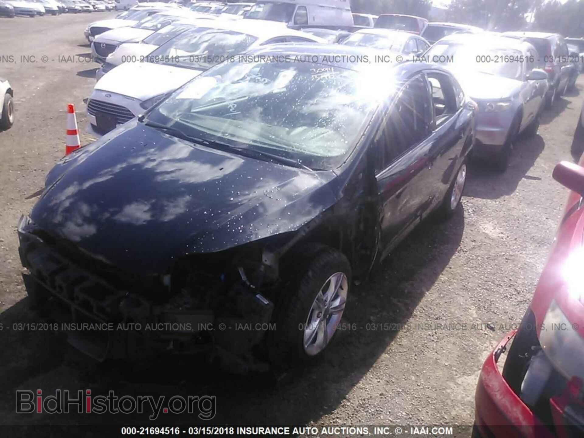 2013 Ford Focus - VIN: 1FADP3F25DL271332 - Photo 2