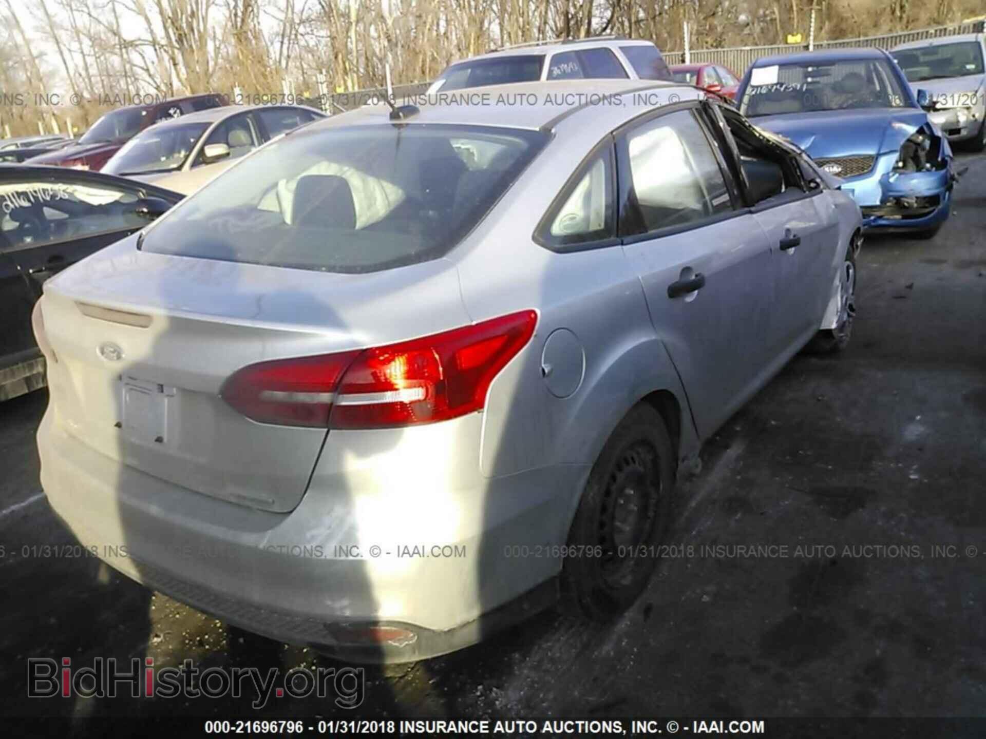 2016 Ford Focus - VIN: 1FADP3E28GL212488 - Фото 4