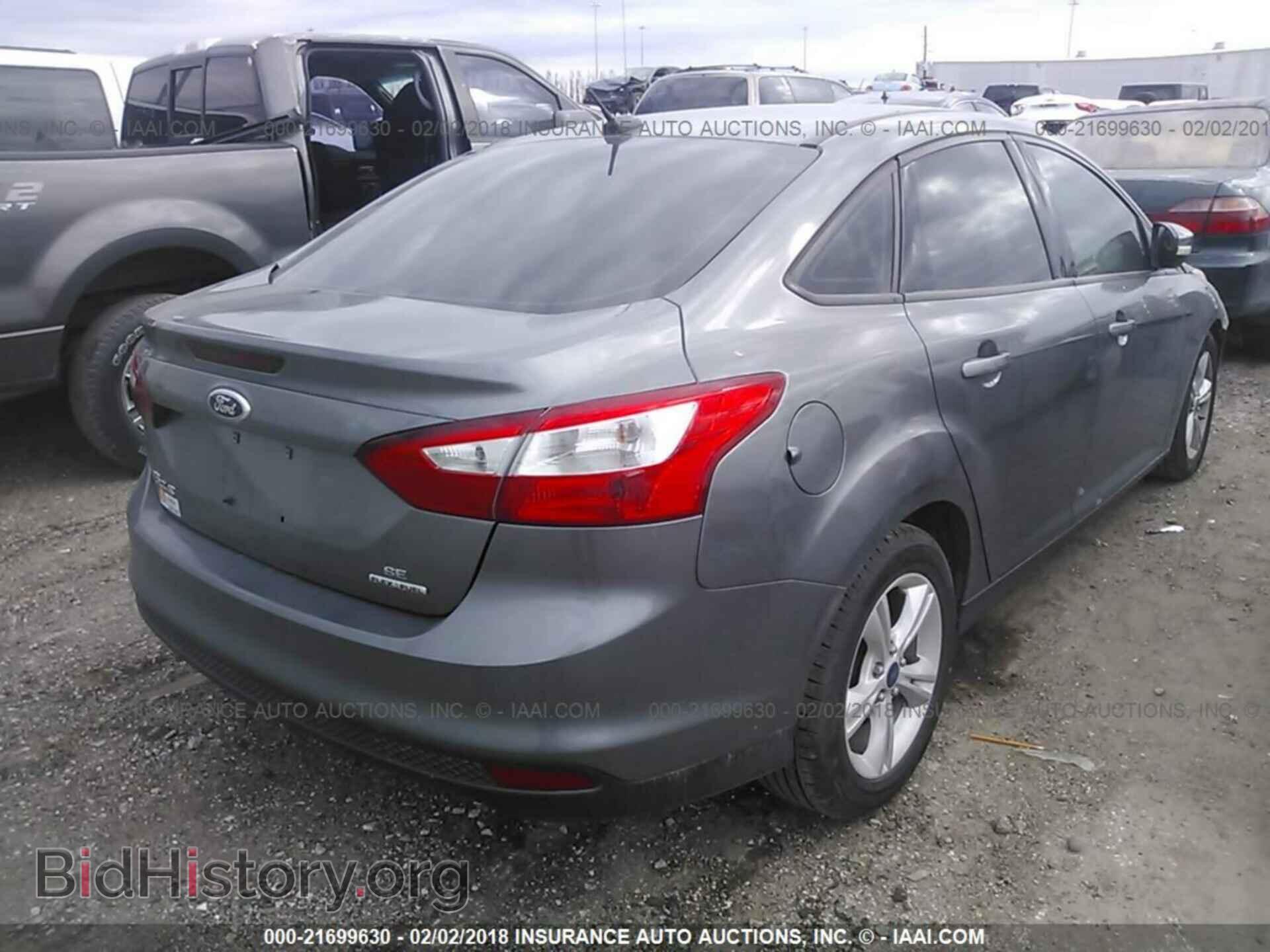 2014 Ford Focus - VIN: 1FADP3F29EL419760 - Фото 4