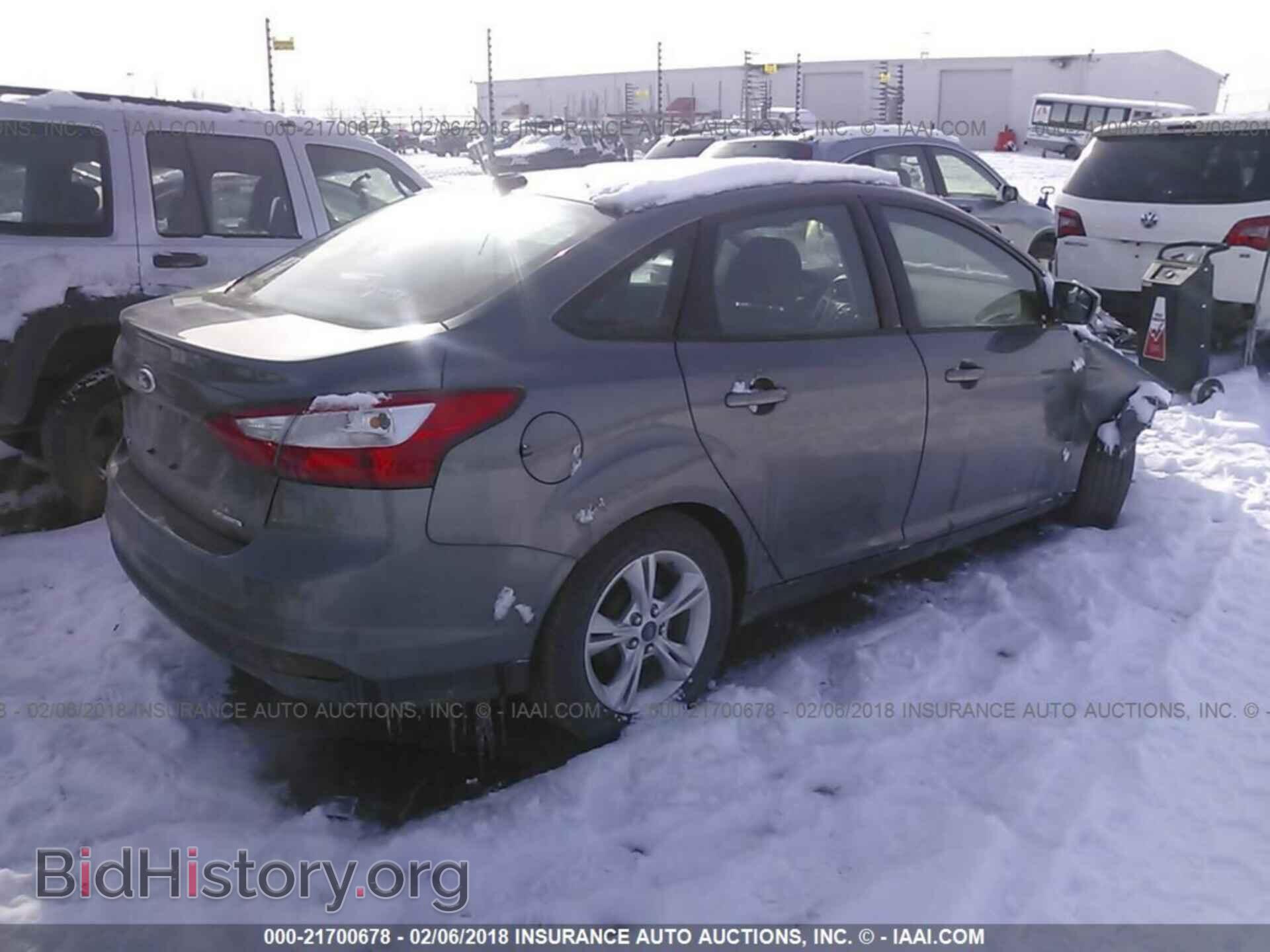 2014 Ford Focus - VIN: 1FADP3F2XEL339674 - Photo 4