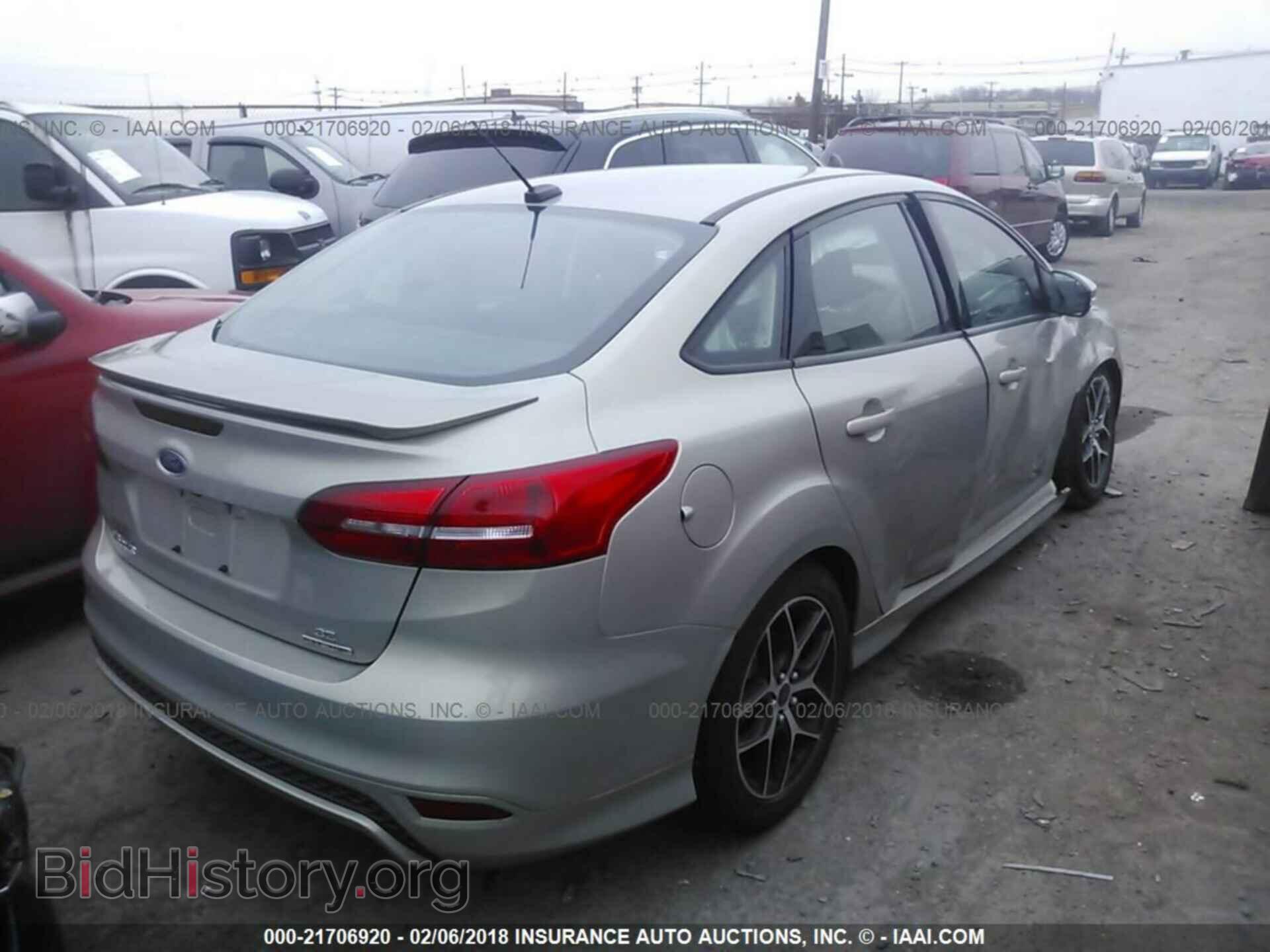 2015 Ford Focus - VIN: 1FADP3F20FL305874 - Photo 4