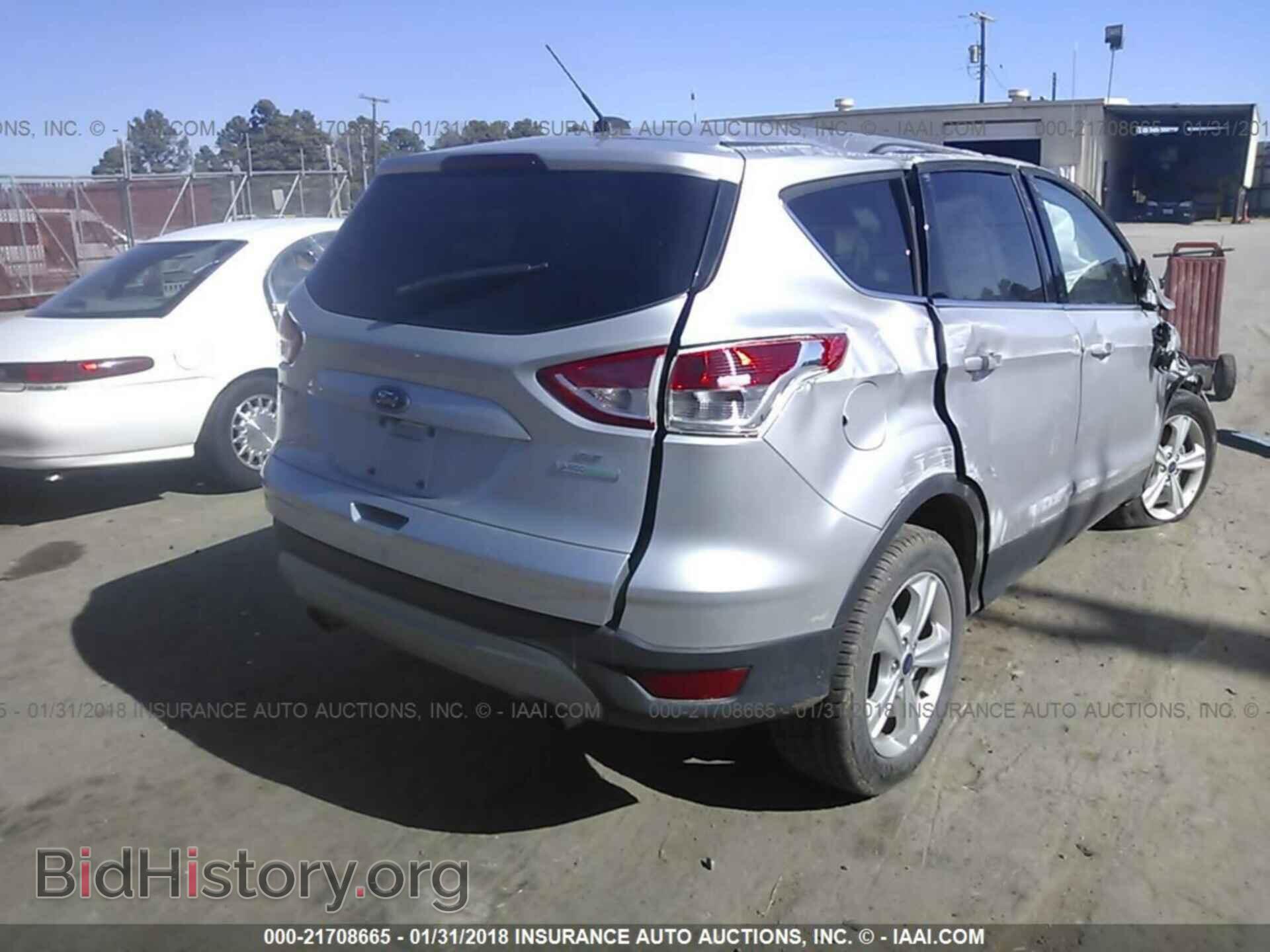 2014 Ford Escape - VIN: 1FMCU0GX2EUB61563 - Photo 4