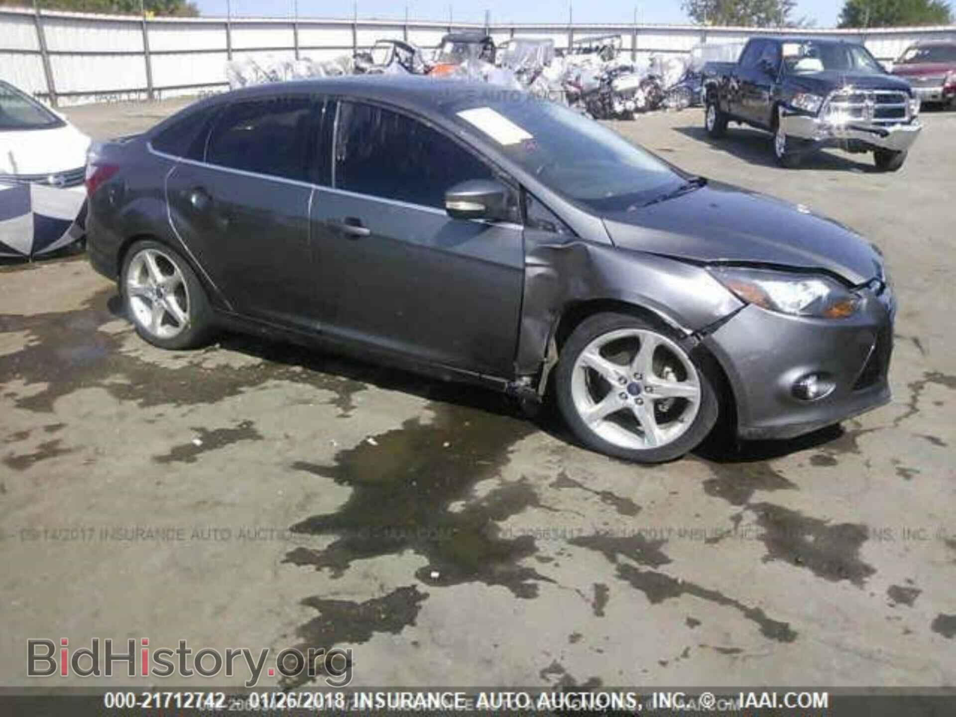 Фотография 1FADP3J27EL223999 - Ford Focus 2014