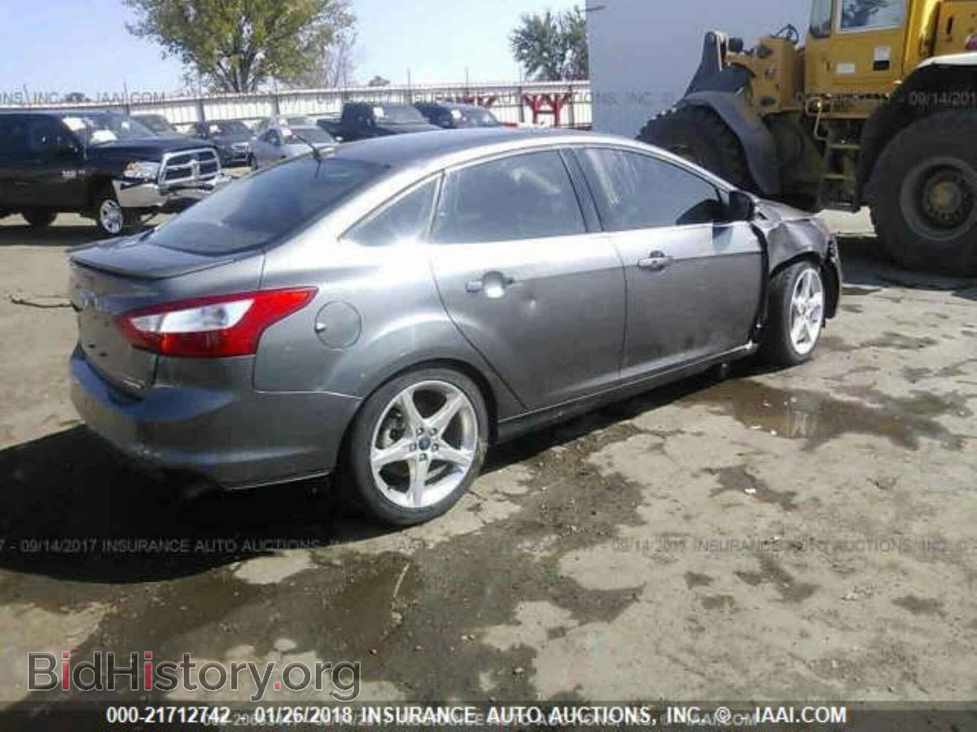 2014 Ford Focus - VIN: 1FADP3J27EL223999 - Фото 4