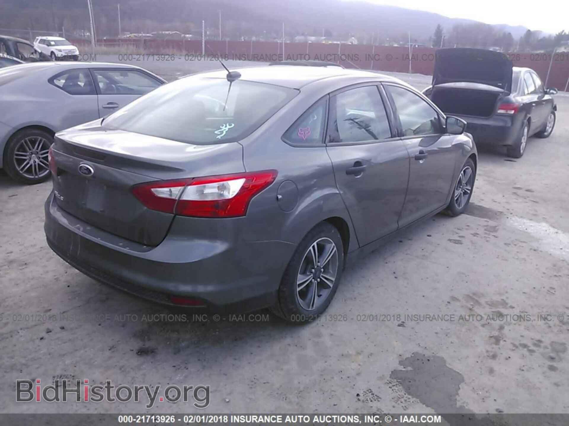 2014 Ford Focus - VIN: 1FADP3E25EL227009 - Photo 4