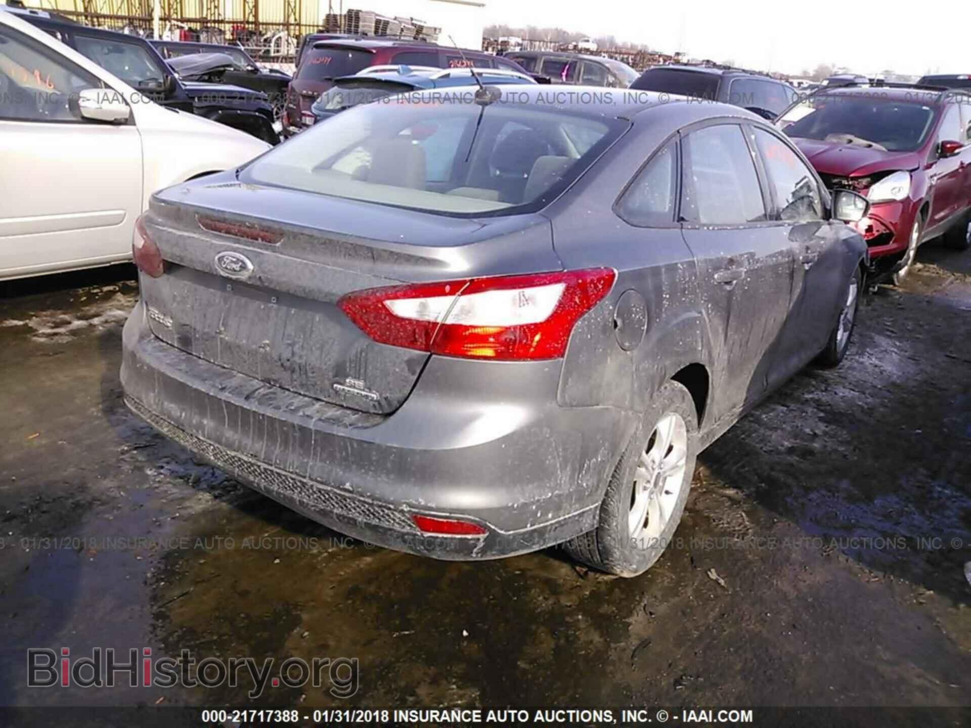 2014 Ford Focus - VIN: 1FADP3F27EL246112 - Фото 4