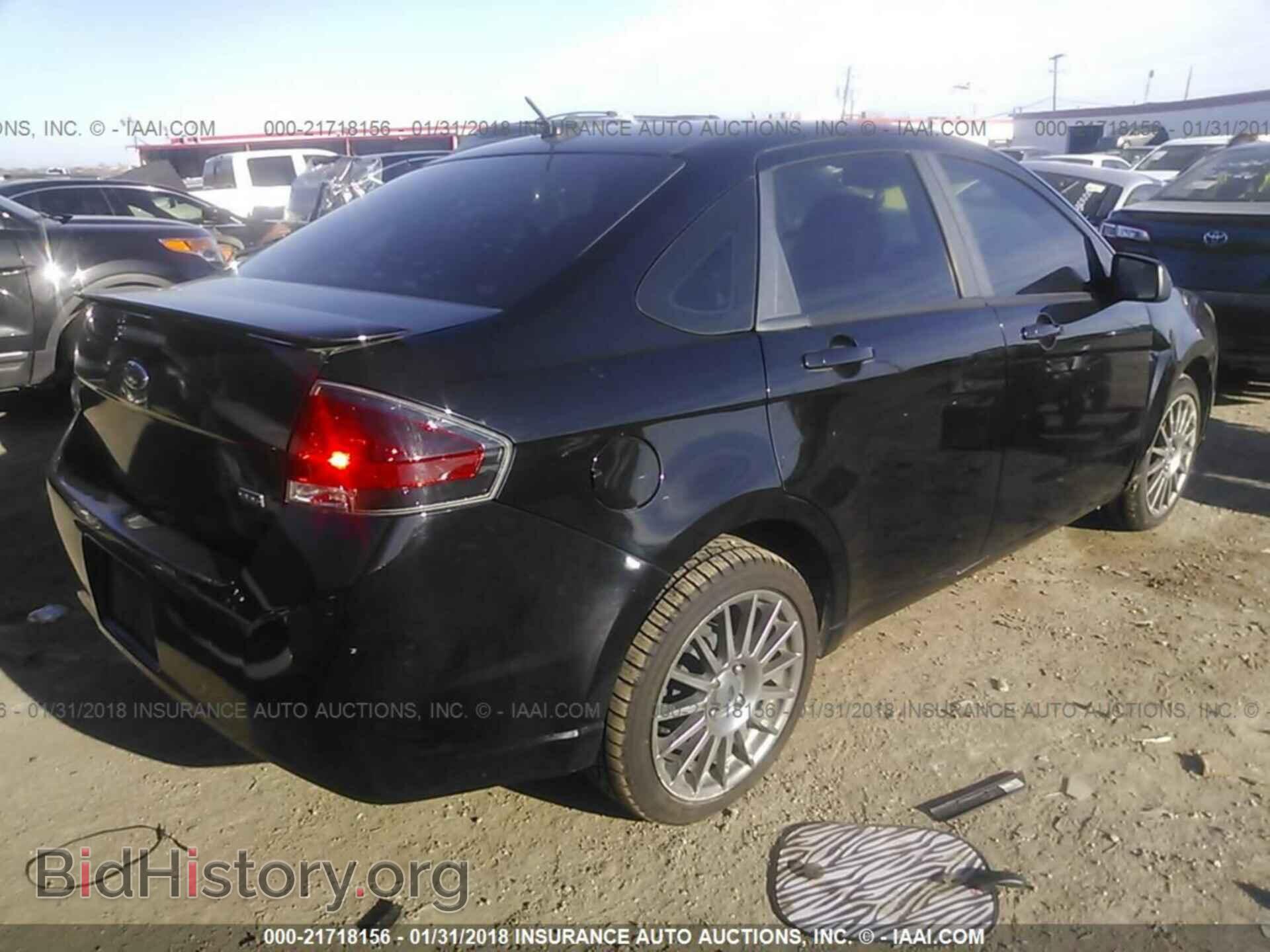 2011 Ford Focus - VIN: 1FAHP3GN5BW202064 - Photo 4