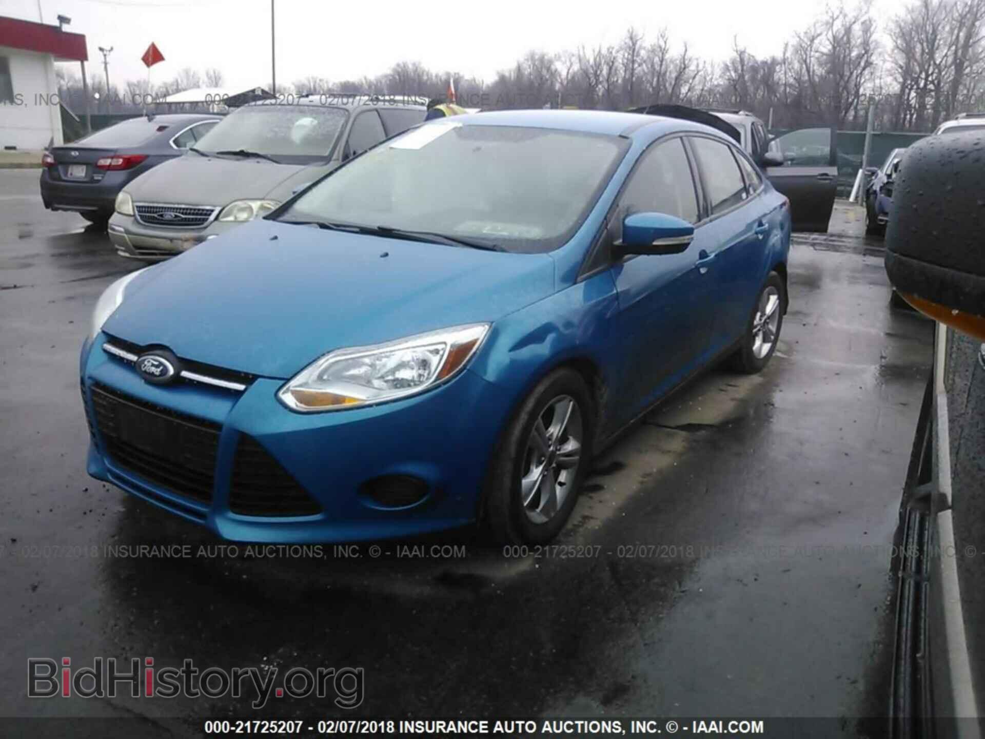 2014 Ford Focus - VIN: 1FADP3F21EL285651 - Photo 2
