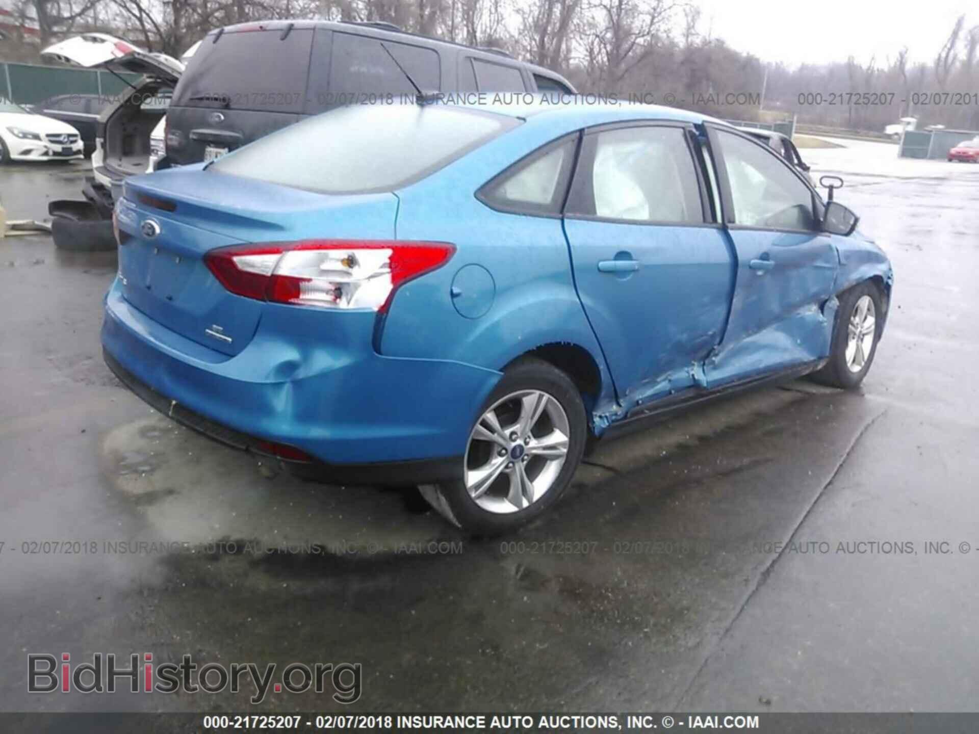 2014 Ford Focus - VIN: 1FADP3F21EL285651 - Photo 4