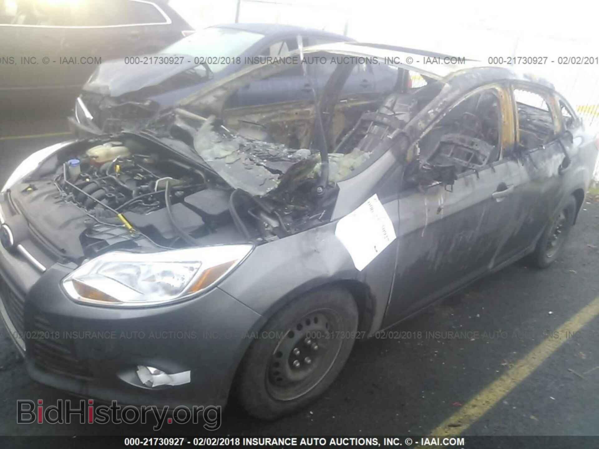 2014 Ford Focus - VIN: 1FADP3F27EL113155 - Фото 2