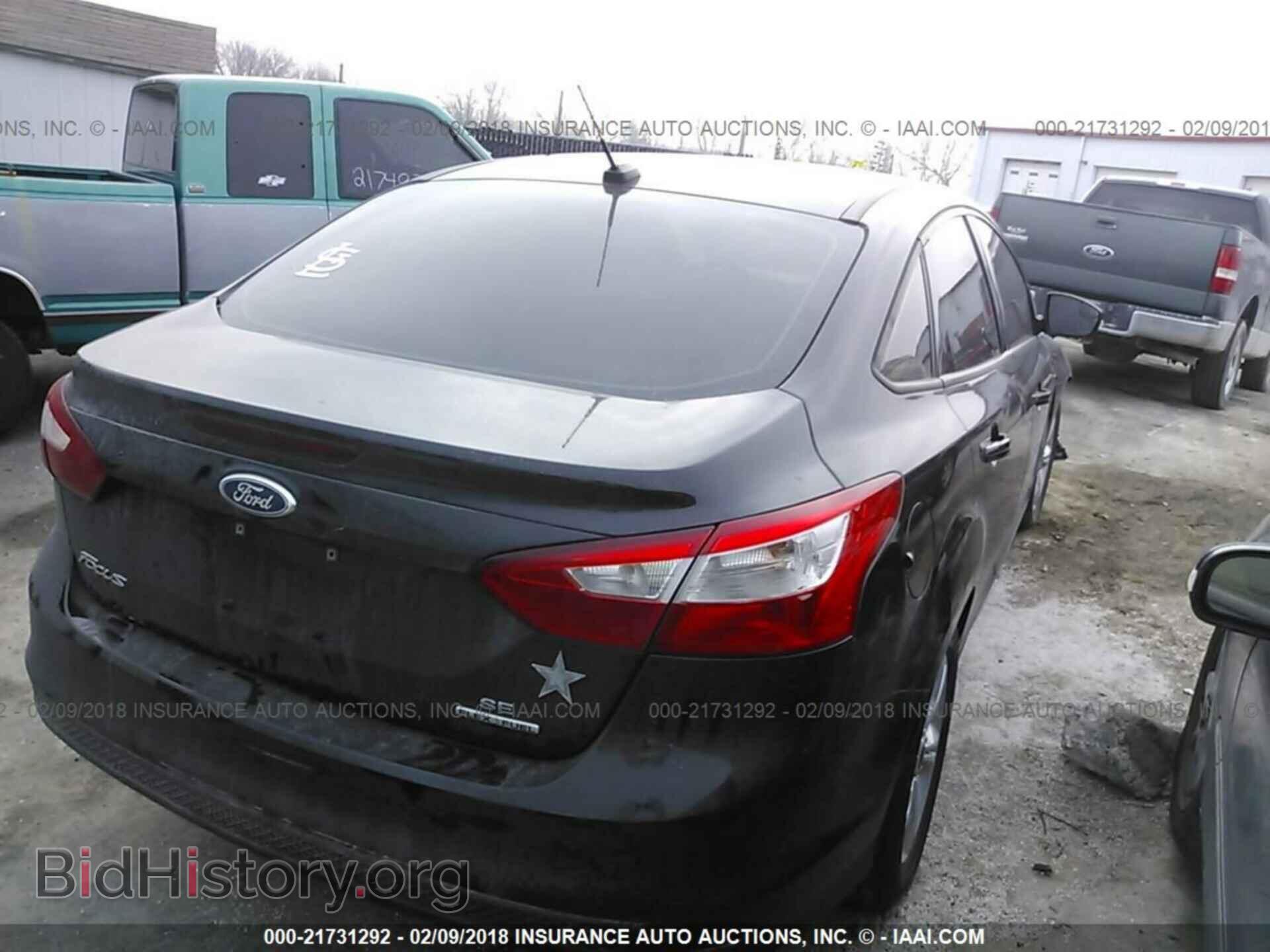 2014 Ford Focus - VIN: 1FADP3F23EL109832 - Фото 4