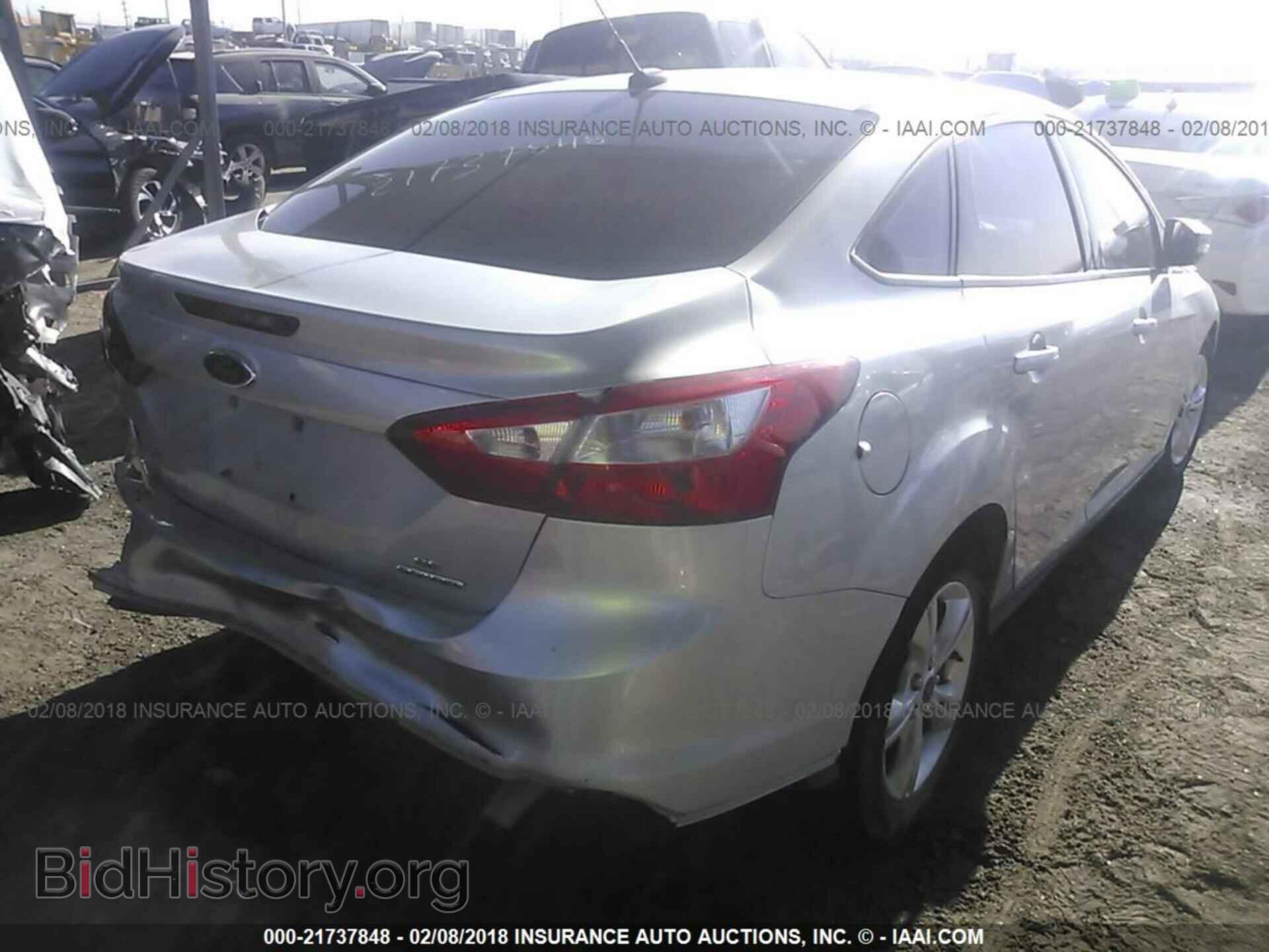 2014 Ford Focus - VIN: 1FADP3F28EL208324 - Фото 4