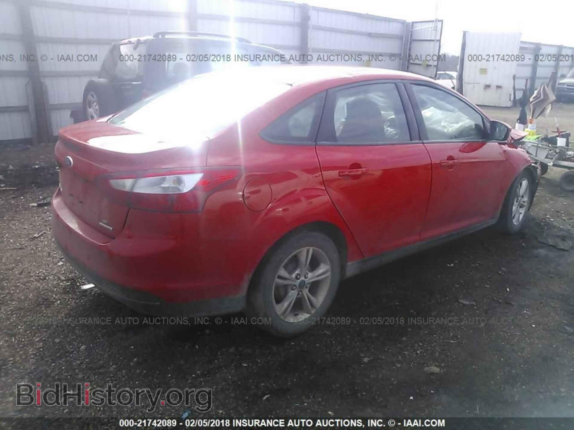 2014 Ford Focus - VIN: 1FADP3F2XEL318050 - Photo 4