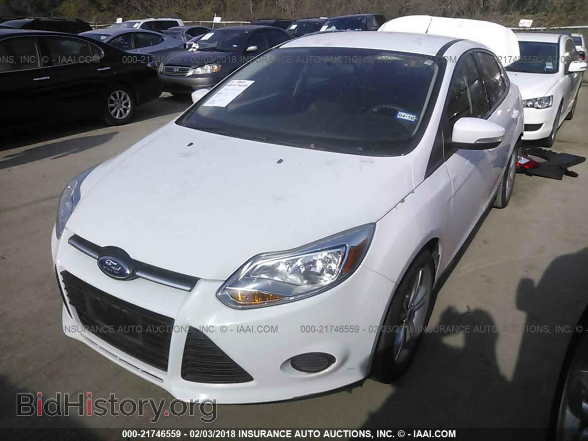 2014 Ford Focus - VIN: 1FADP3F22EL129991 - Фото 2