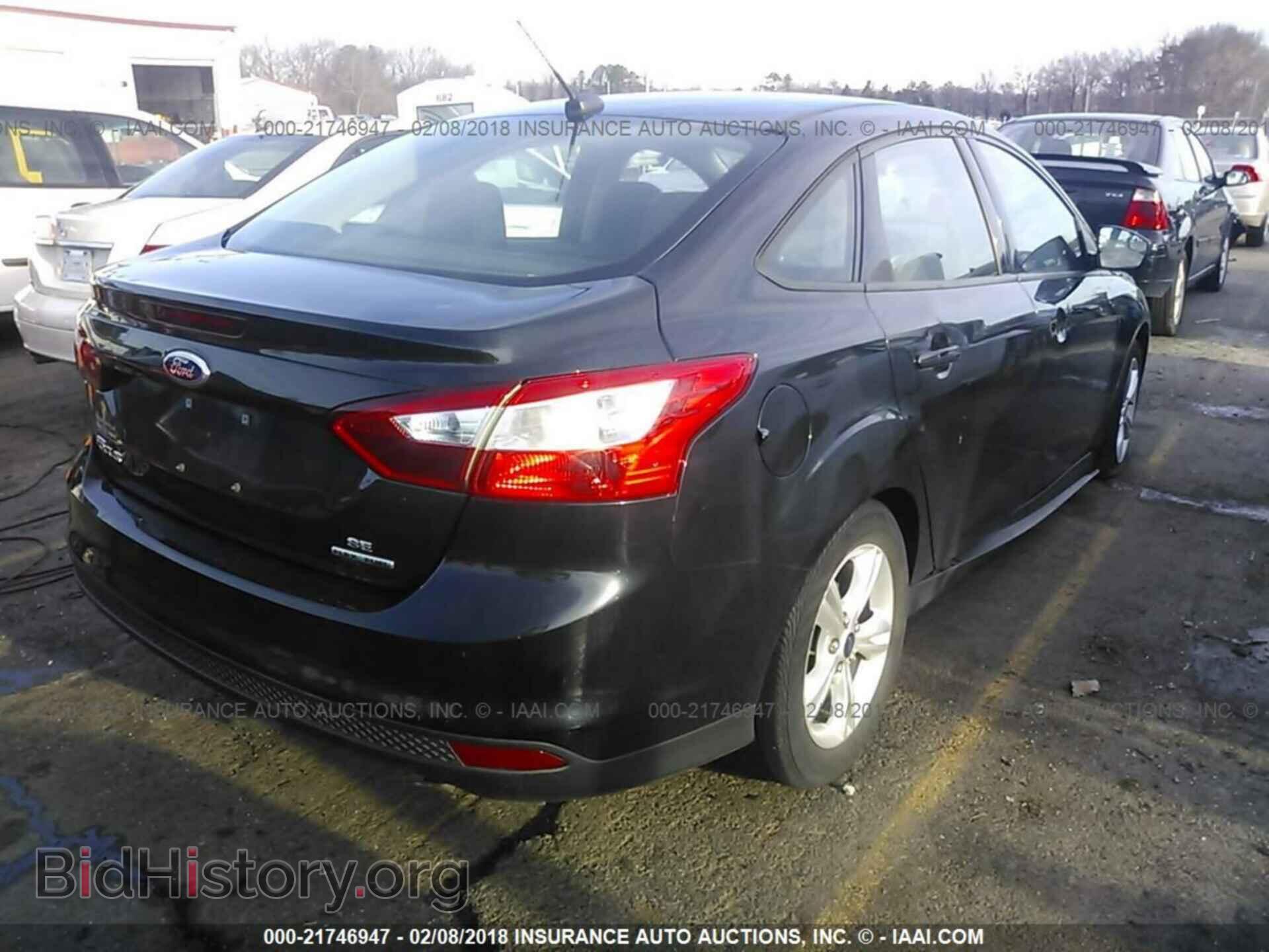 2014 Ford Focus - VIN: 1FADP3F23EL457825 - Photo 4