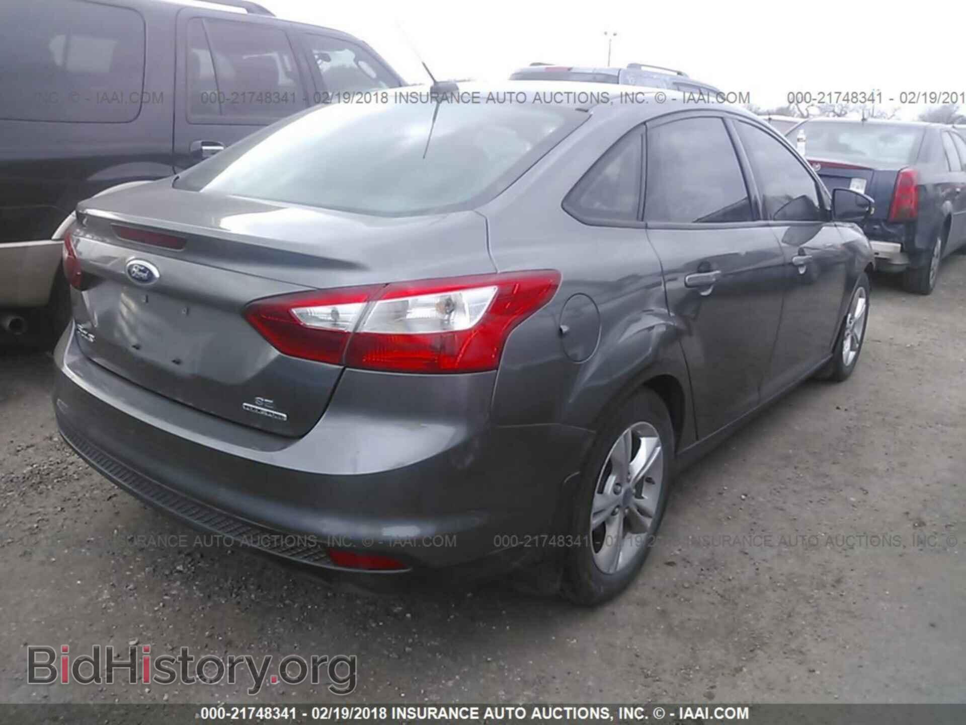2014 Ford Focus - VIN: 1FADP3F25EL130391 - Фото 4