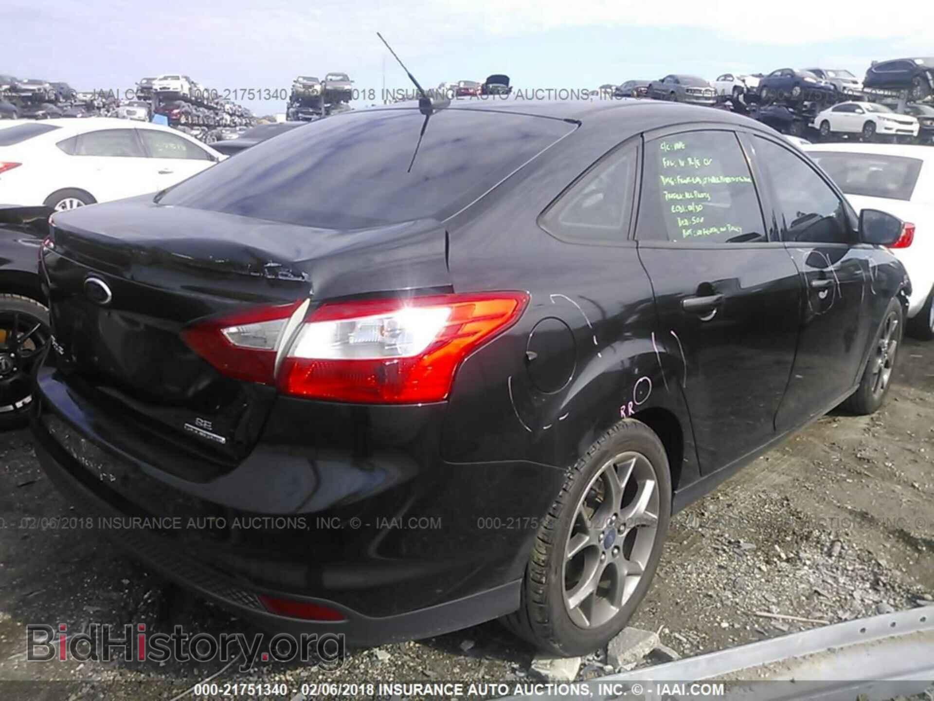 2013 Ford Focus - VIN: 1FADP3F2XDL266370 - Photo 4